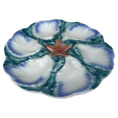 Piatto in maiolica francese Oyster Starfish Digoin, circa 1900