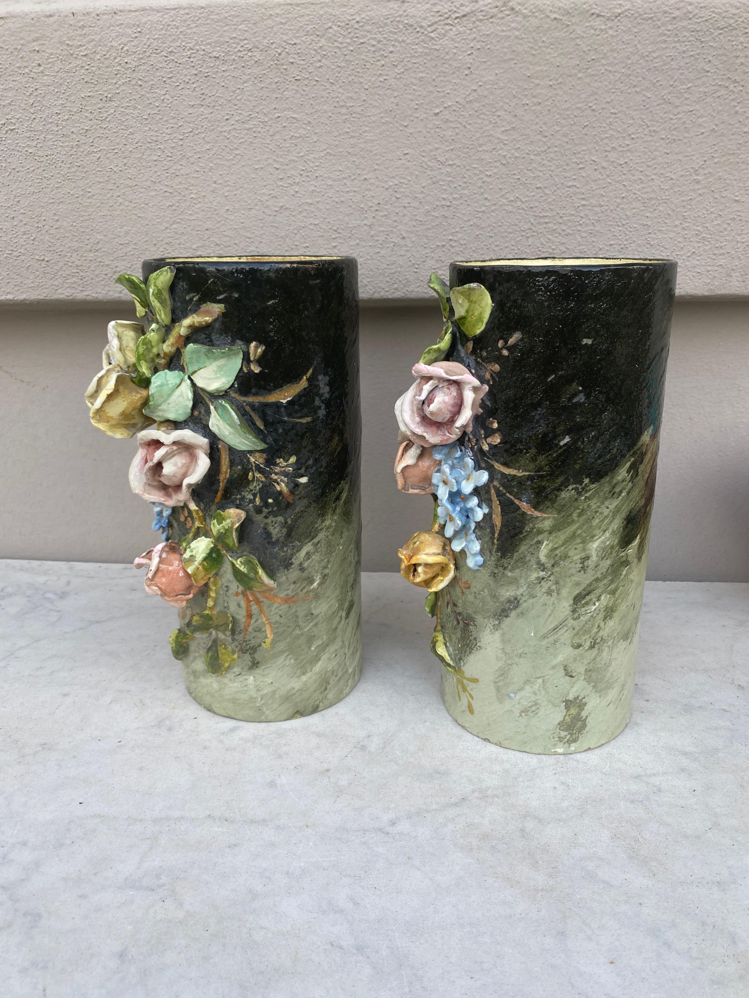 French Majolica pair of vases with flowers signed Edouard Gilles, circa 1880.