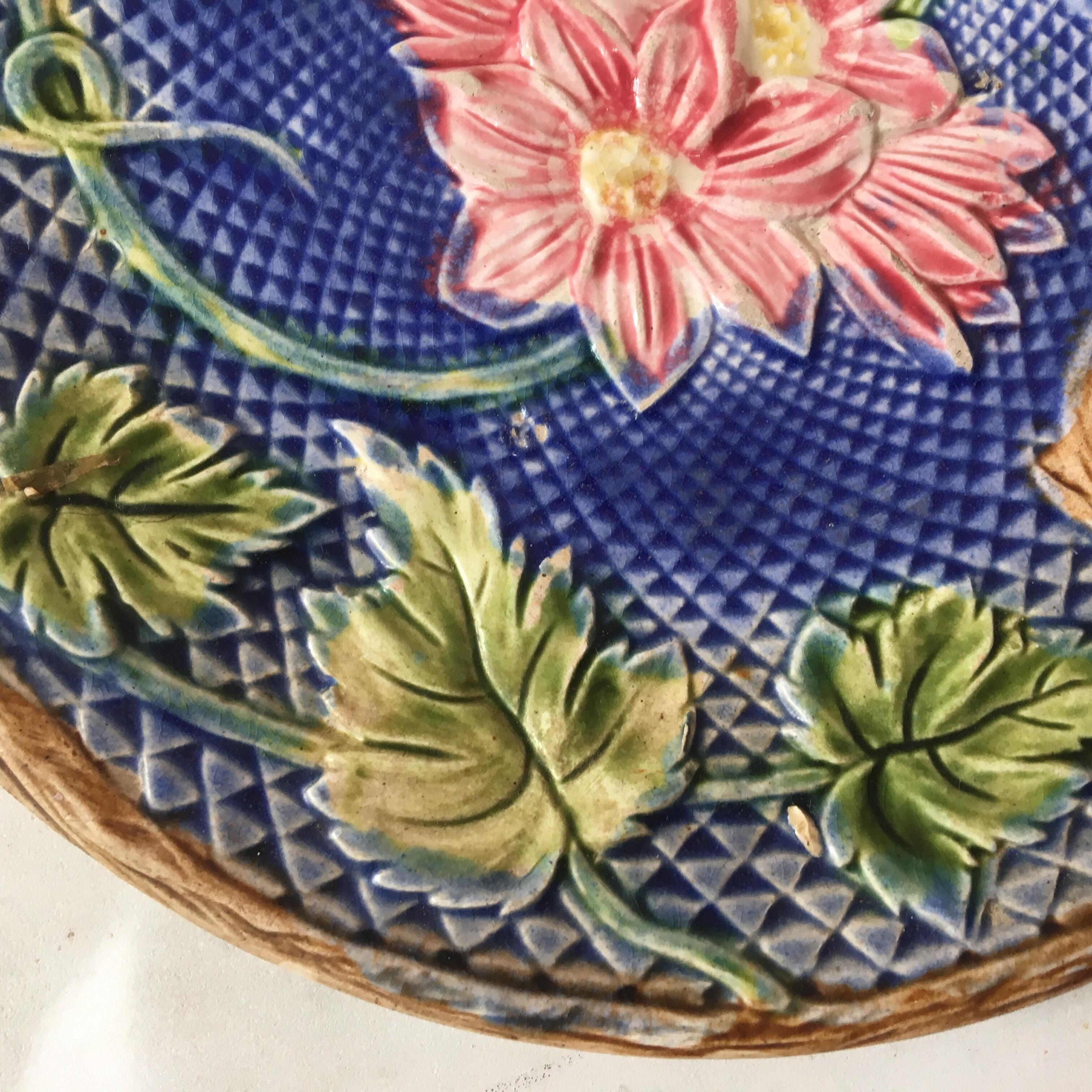 Very rare blue background French Majolica plate pink flowers on basketweave, circa 1880 attributed to Salins.