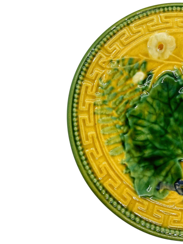 French Majolica (Barbotine) plate, leaf and fern, with blue ribbon and Greek key border on a yellow ground by Choisy-le-Roi, ca. 1880.
For thirty years, we have been among the world's preeminent specialists in fine antique majolica.
Book