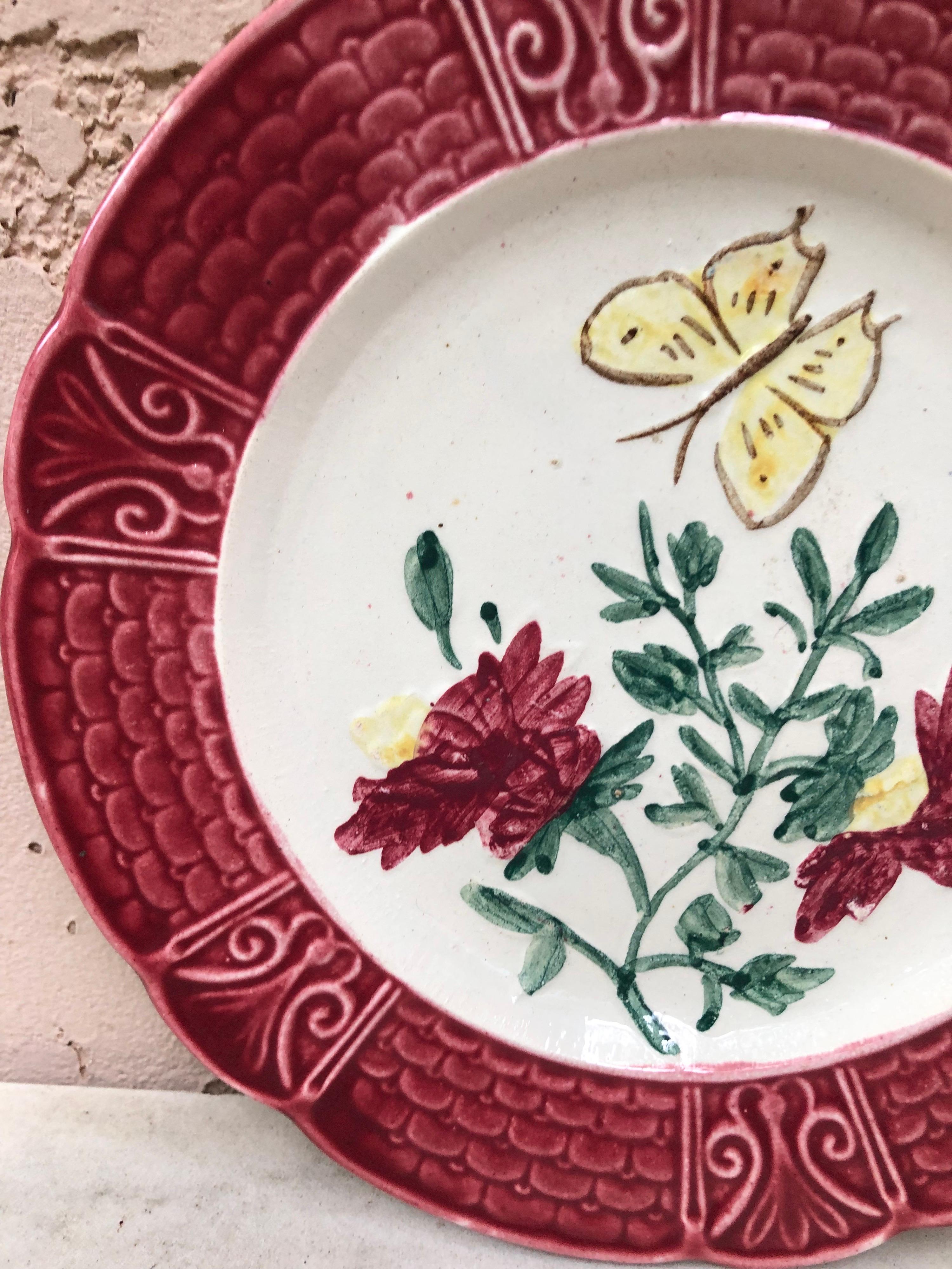 French majolica plate with flowers & butterfly, Circa 1900.