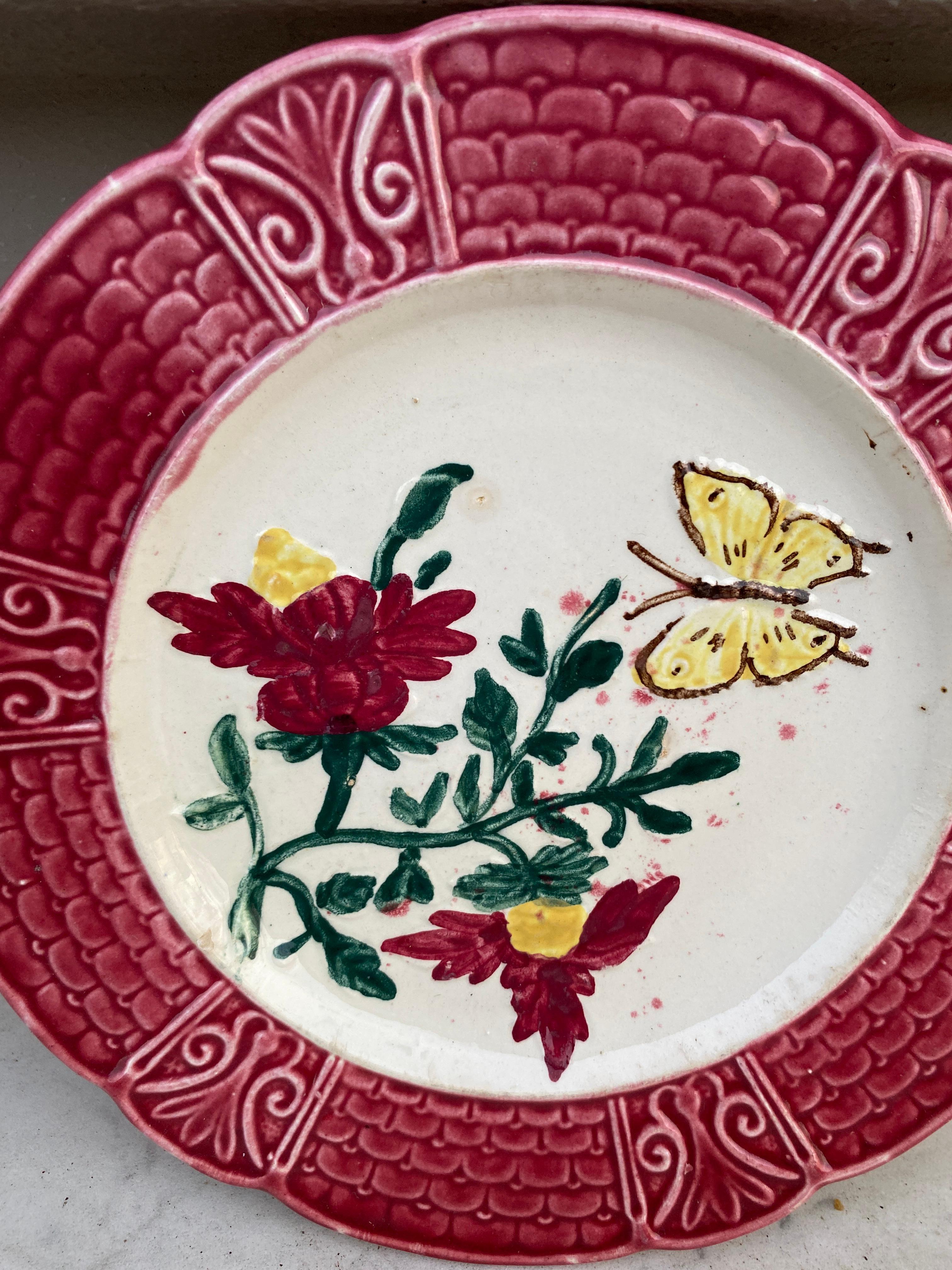 French majolica plate with flowers & butterfly, circa 1900.