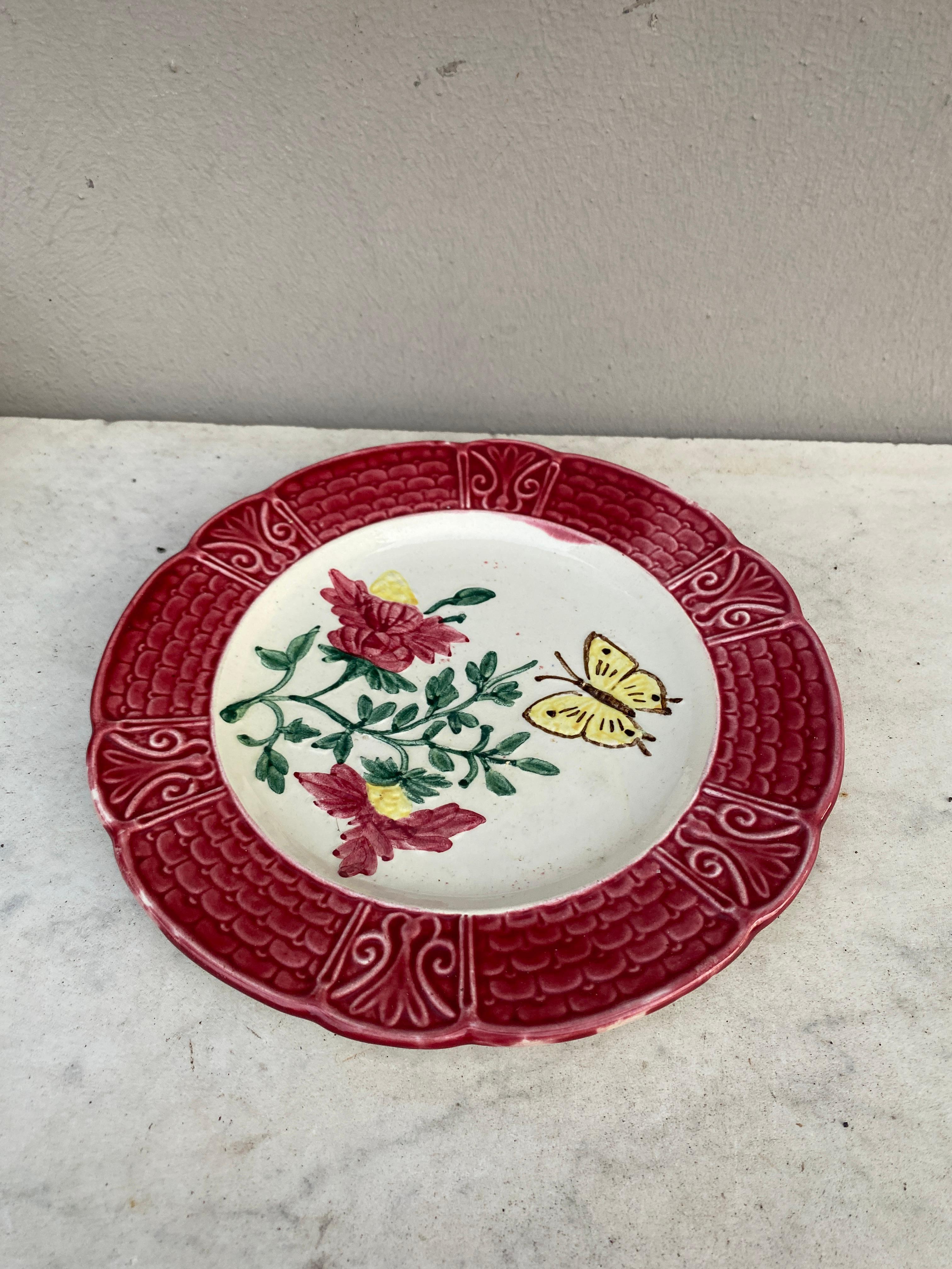 French majolica plate with flowers & butterfly, circa 1900.