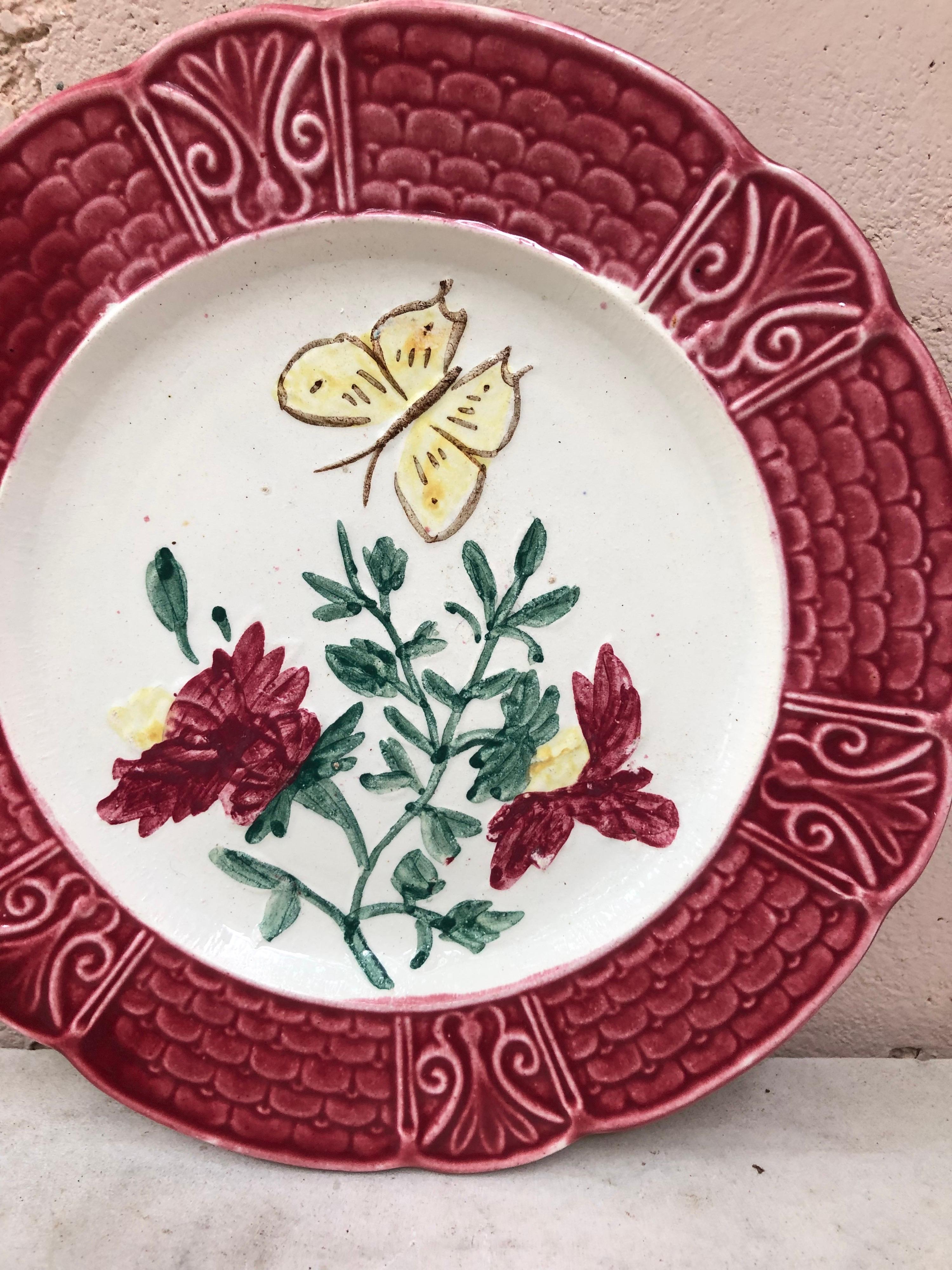 Rustic French Majolica Plate with Flowers & Butterfly, Circa 1900 For Sale
