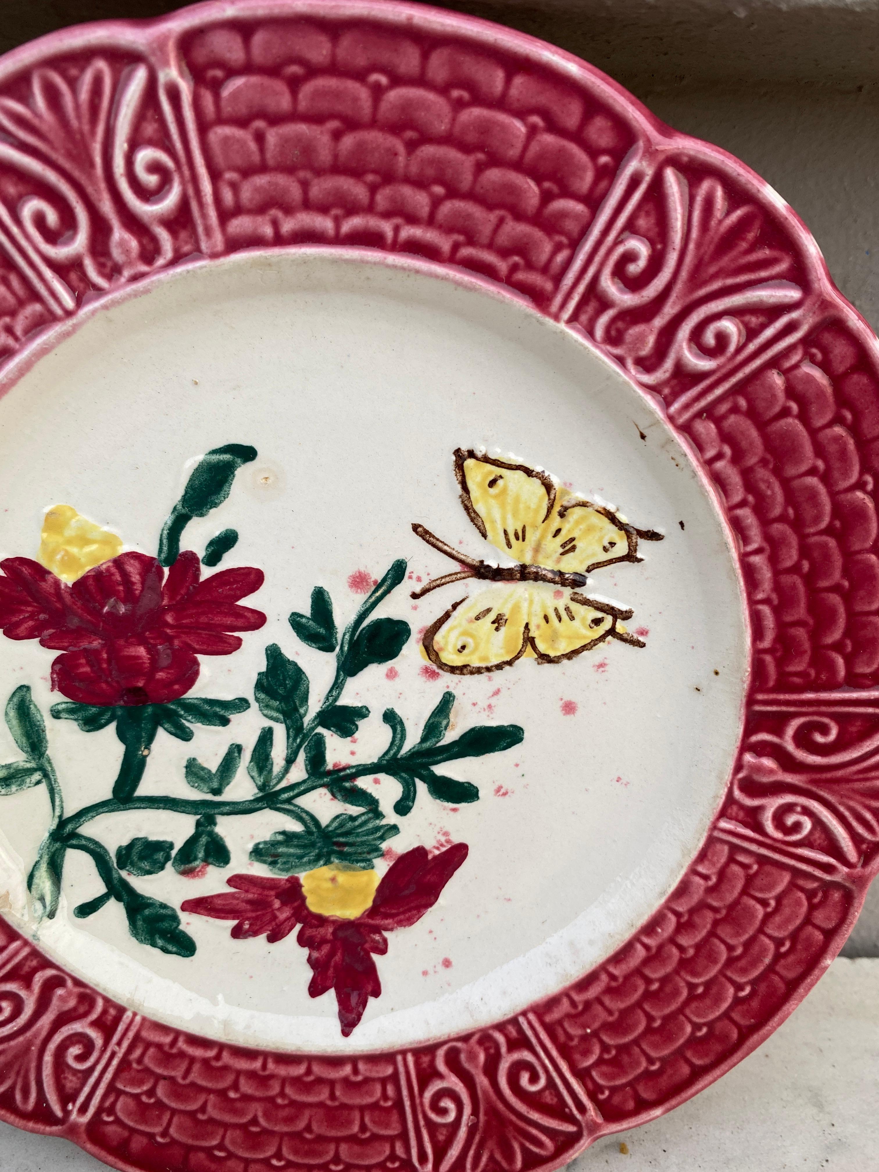 Rustic French Majolica Plate with Flowers & Butterfly, circa 1900 For Sale