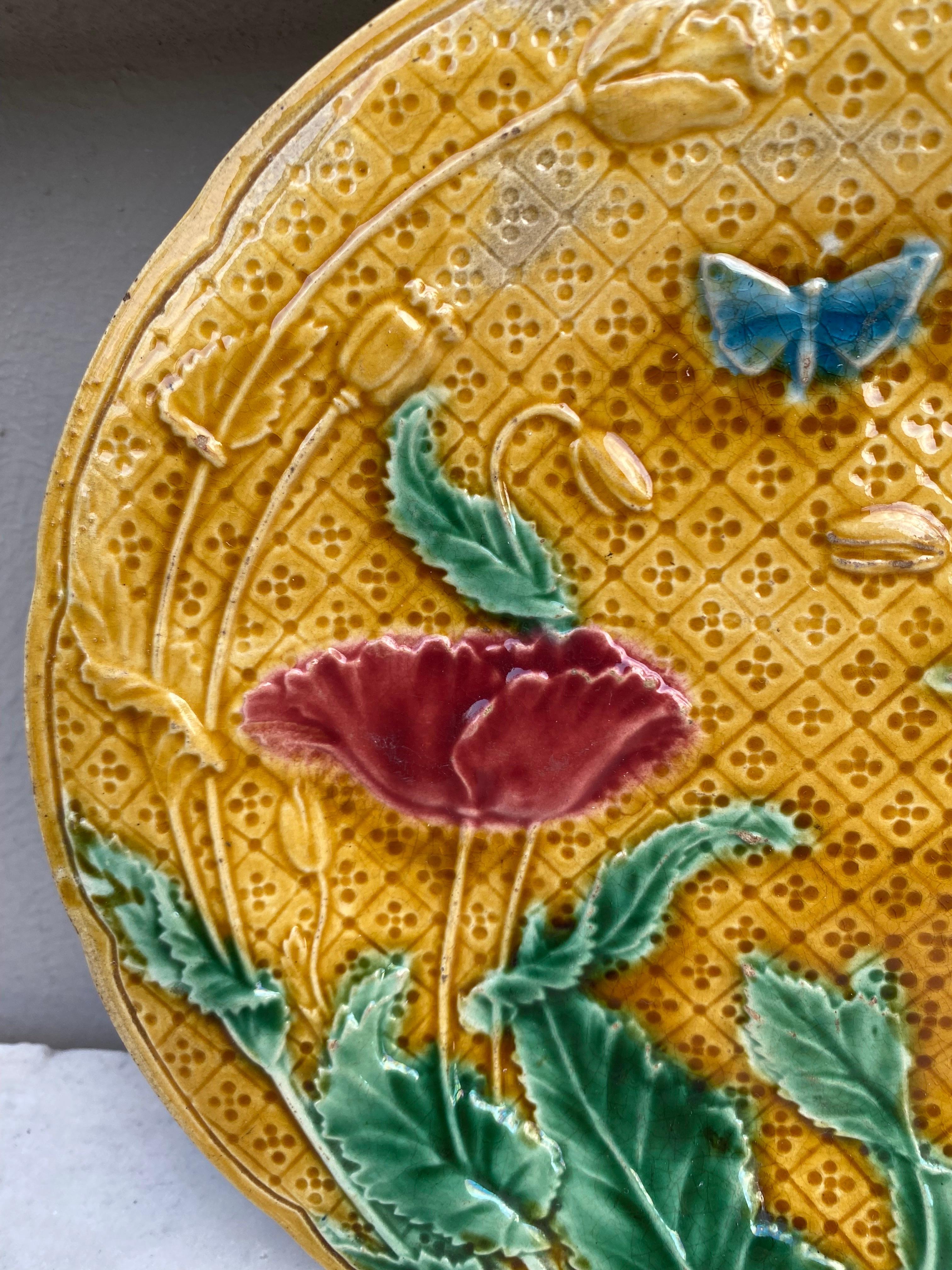 French Majolica Poppies and butterfly plate Gien, circa 1880.
Very rare color.
This plate have an original default hairline made during the production.