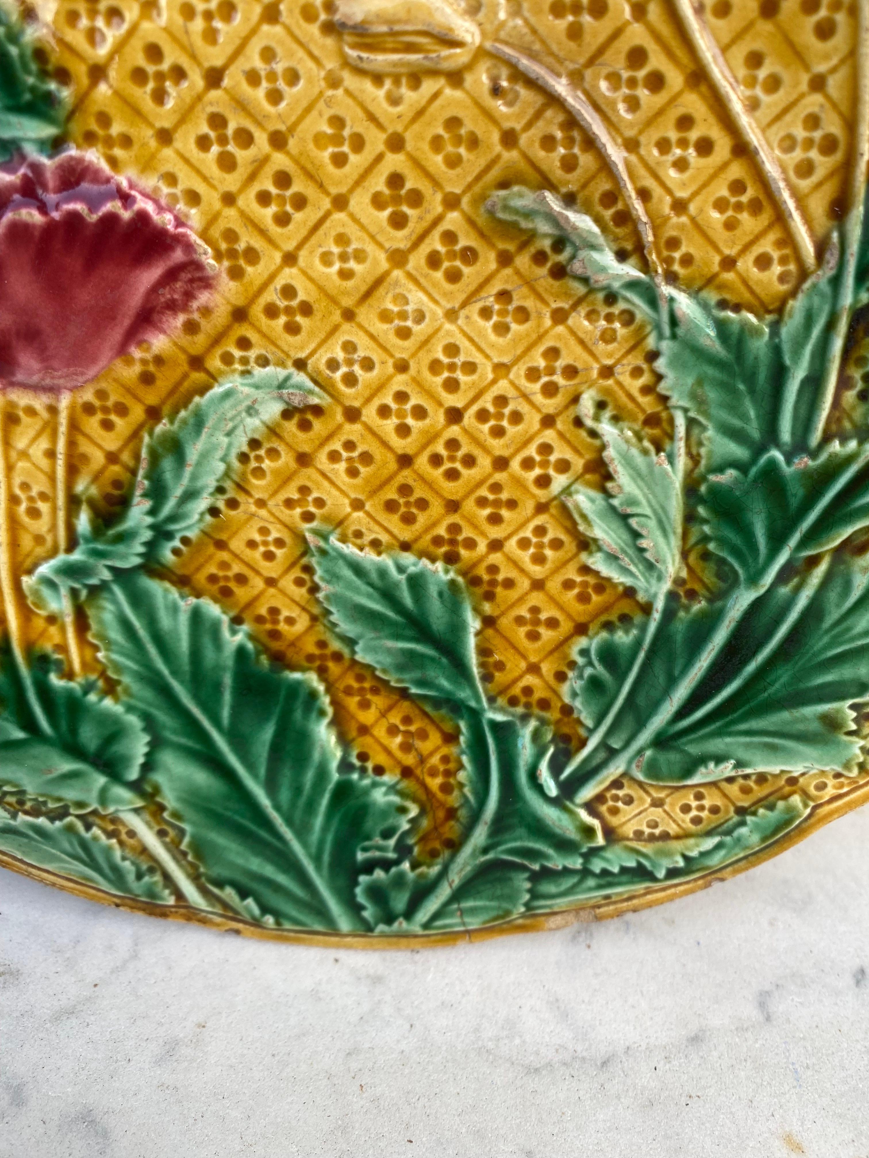 French Majolica Poppies and butterfly plate Gien, circa 1880.
Very rare color.
This plate have an original default hairline made during the production.