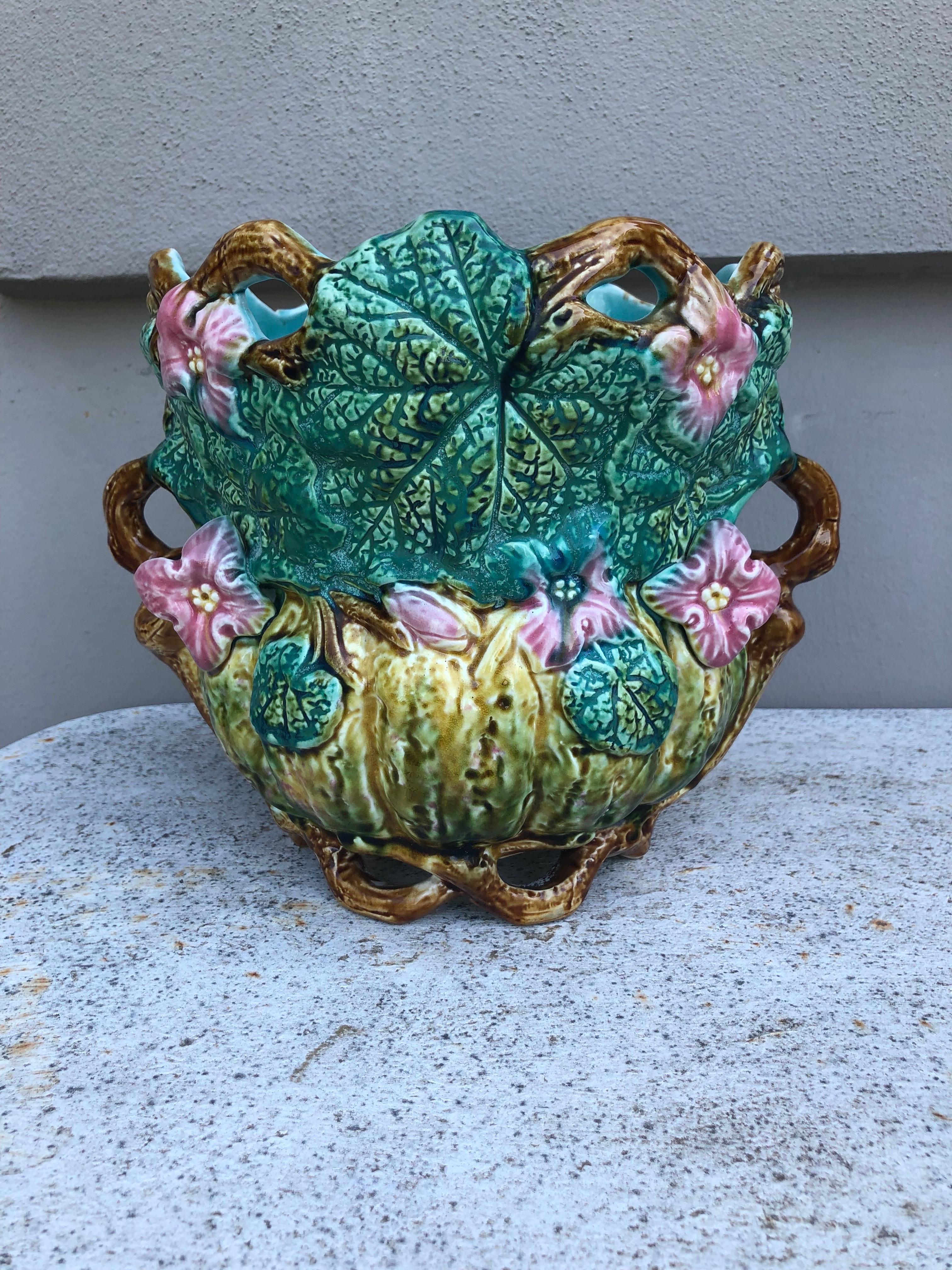 Majolica pumpkin jardiniere signed Onnaing, circa 1890, a reticulated planter with pumpkin flowers signed Onnaing 407.