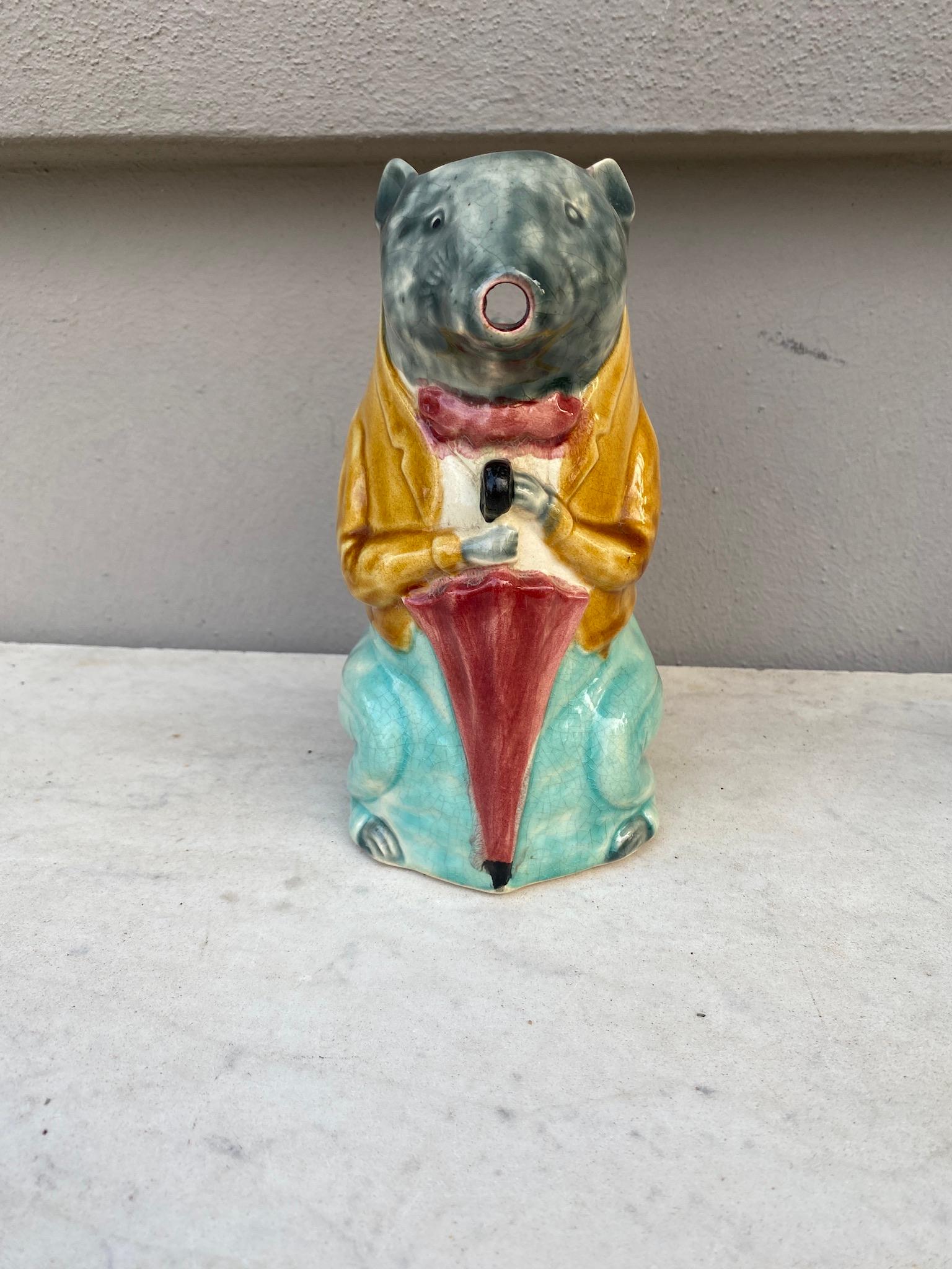 French Majolica Rat Pitcher Poet Laval, circa 1900.
The rat wear a jacket and hold an umbrella.