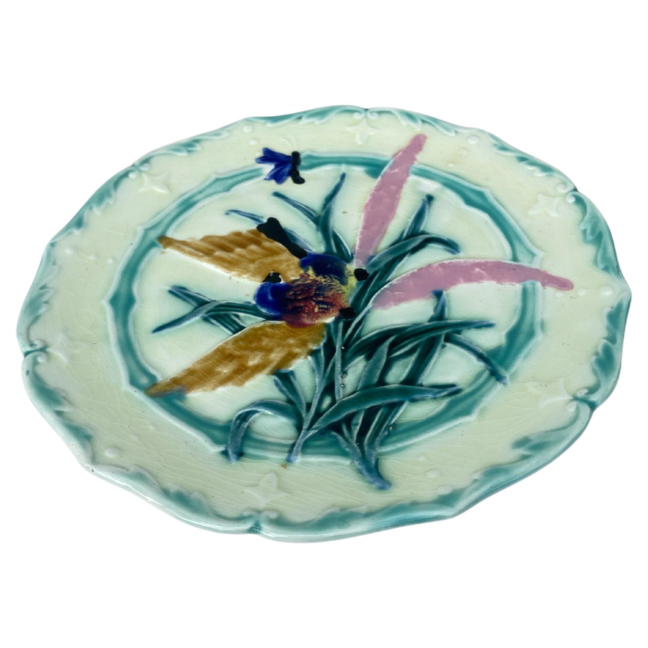 Lovely Majolica plate with bird and insect, leaves signed Saint Amand, circa 1890.