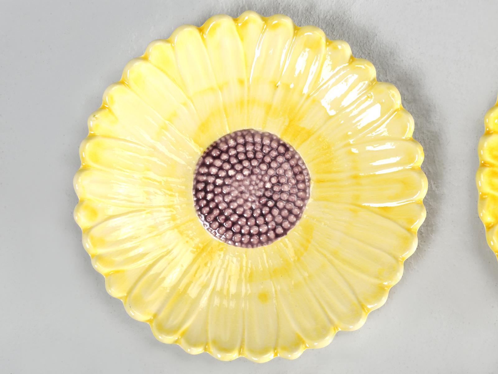 French majolica, set of (4) sunflower pattern salad, or dessert plates, that were handmade in the south of France by a father and daughter. We are estimating that they are about 20 years old and are no longer produced to the best of our knowledge.