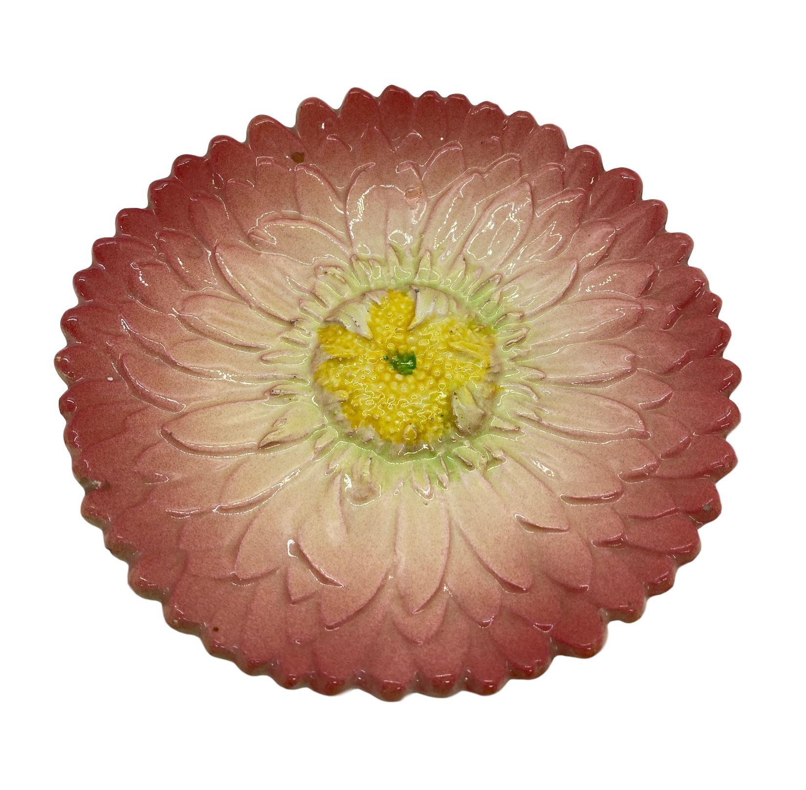 French Majolica Trompe L'oeil pink sunflower plate by Delphin Massier, circa 1870, measures: 8 inches, naturalistically relief molded as a French pink sunflower, signed to reverse, 'Delphin Massier Vallauris (A.M.).'
For over 28 years we have been