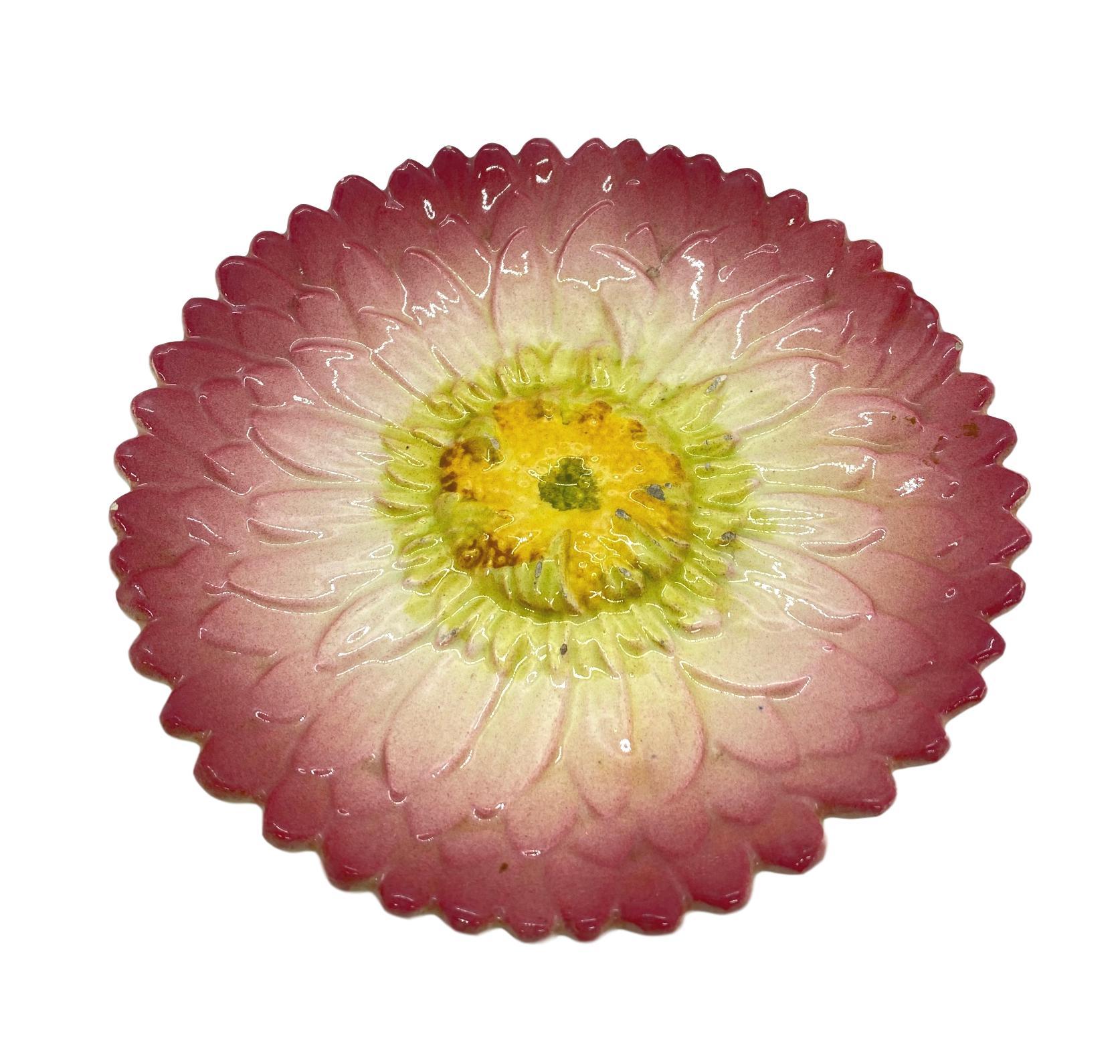 French Majolica Trompe L'oeil pink sunflower plate by Delphin Massier, circa 1870, measures: 8 inches, naturalistically relief molded as a French pink sunflower, signed to reverse, 'Delphin Massier Vallauris (A.M.).'
For over 28 years we have been