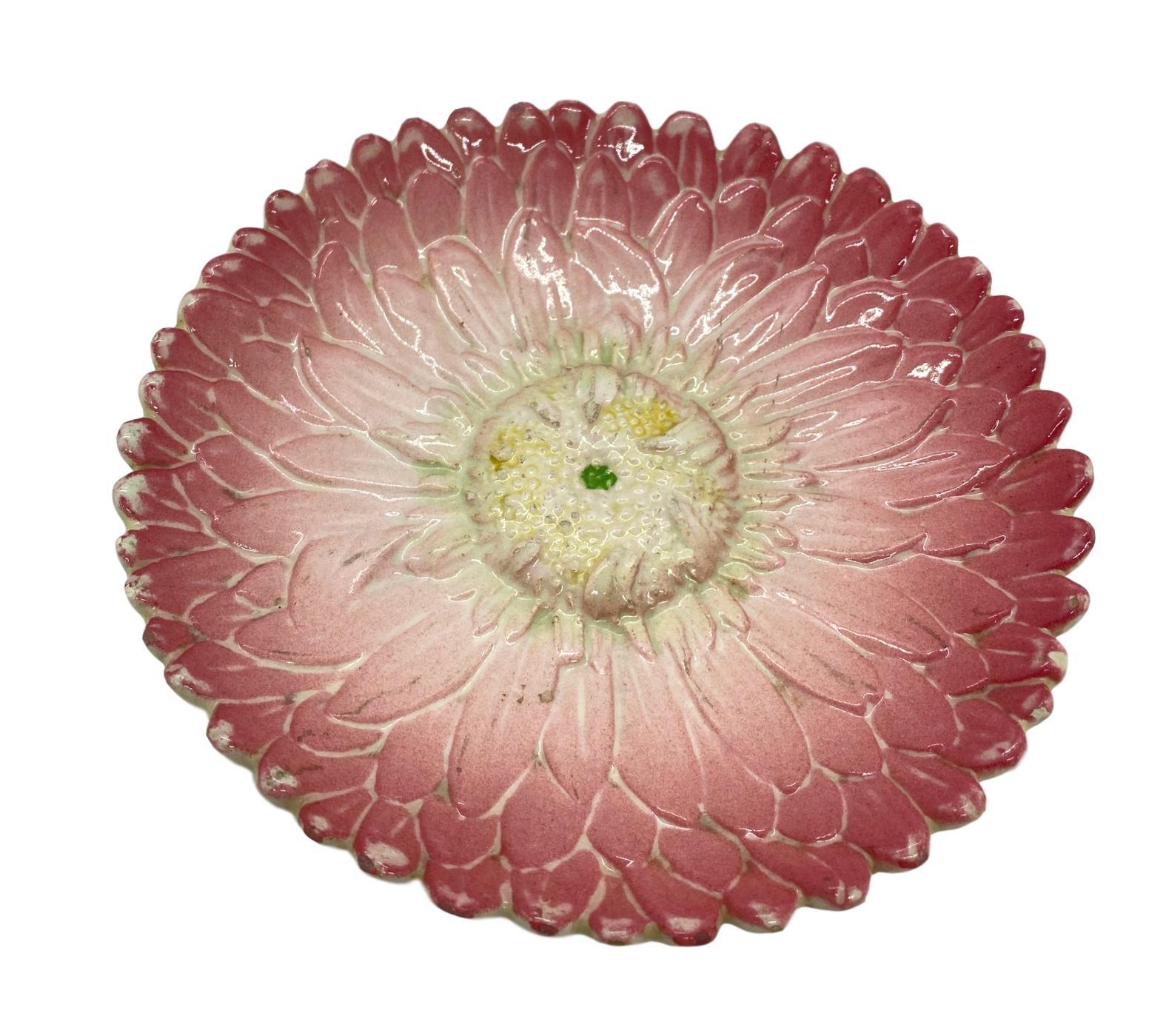 French Majolica Trompe L'oeil pink sunflower plate by Delphin Massier, circa 1870, measures: 8 inches, naturalistically relief molded as a French pink sunflower, signed to reverse, 'Delphin Massier Vallauris (A.M.).'
For over 28 years we have been