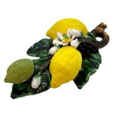 Placca da parete in maiolica francese Trompe L'oeil con limoni, Perret-Gentil Menton