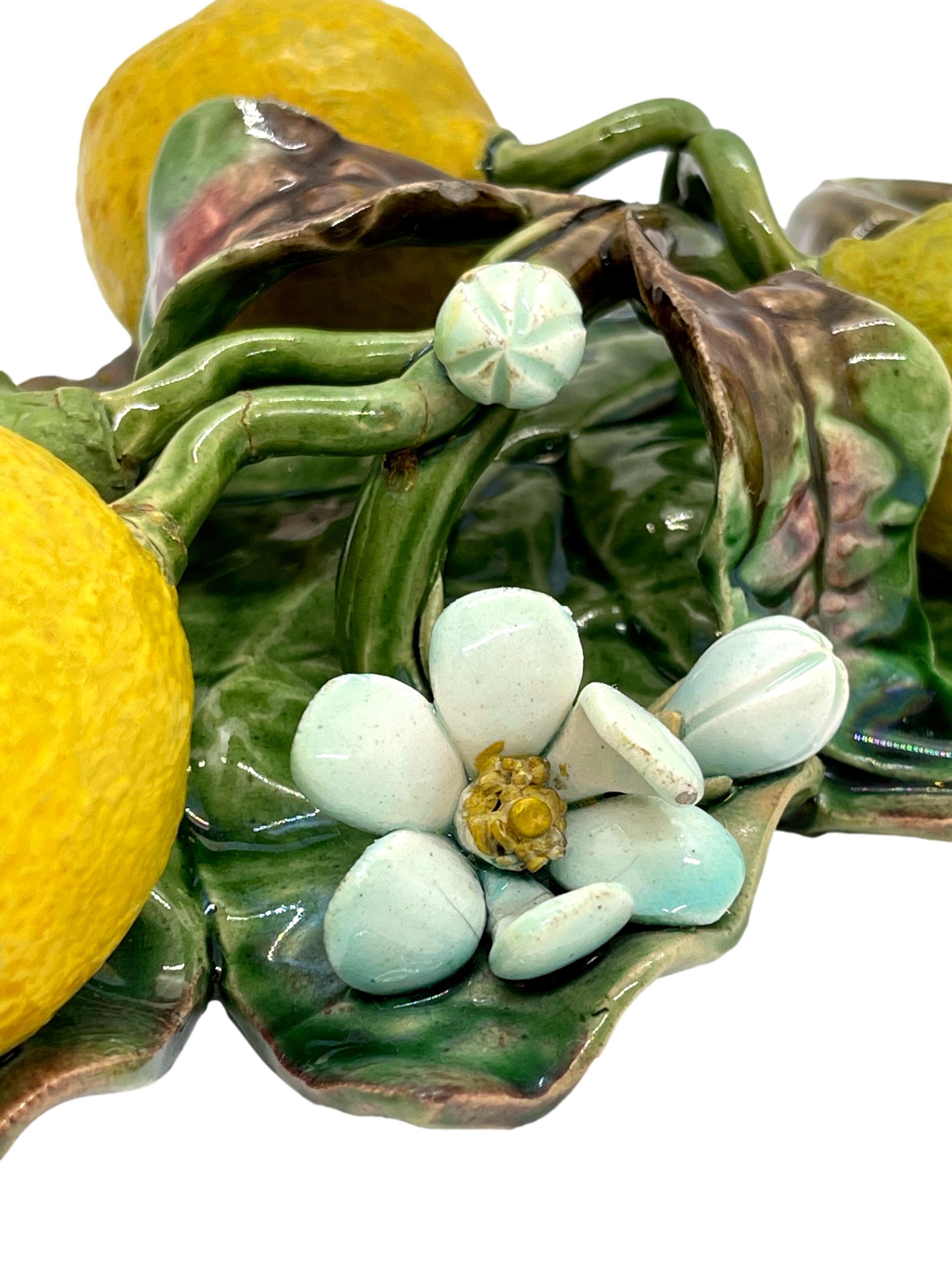 Menton French Majolica (Barbotine) Trompe L'oeil wall plaque, with lemons molded in high relief, circa 1880.
 
Generally referred to as 