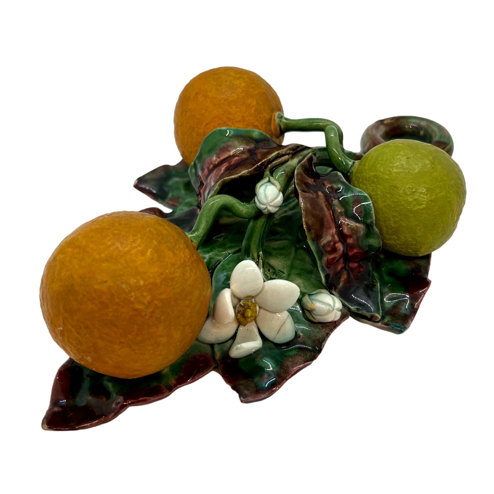 Menton French Majolica (Barbotine) Trompe L'oeil Wall Plaque with oranges molded in high relief, circa 1880.
 
Generally referred to as 