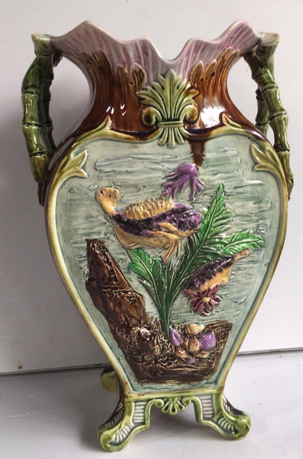 French Majolica vase with fishs and shells, circa 1880.
Bamboo handles.
  