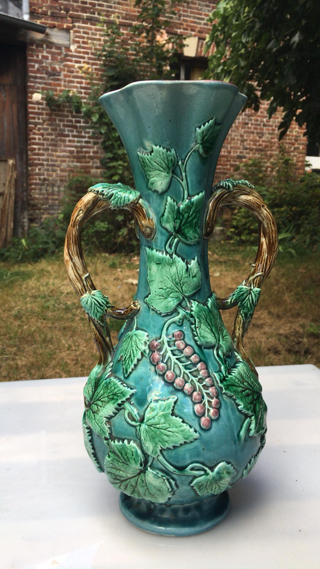 French Majolica vase with leaves and berries, circa 1880.
  