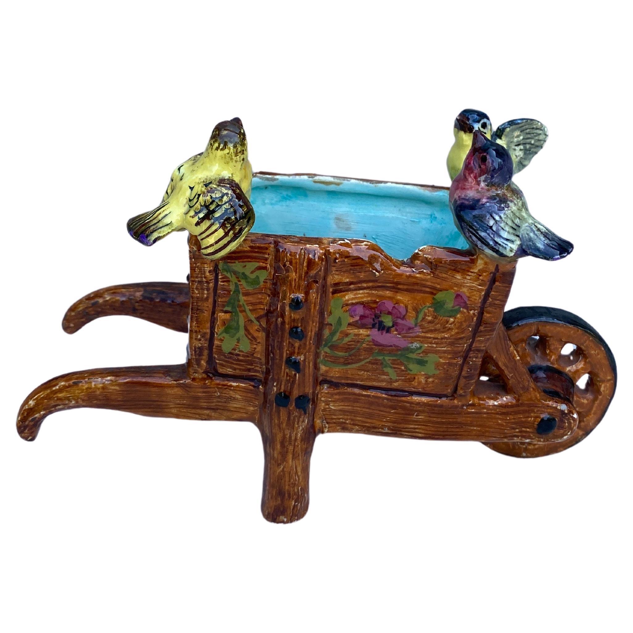 French Majolica Wheelbarrow jardiniere with birds signed Jerome Massier, Circa 1900