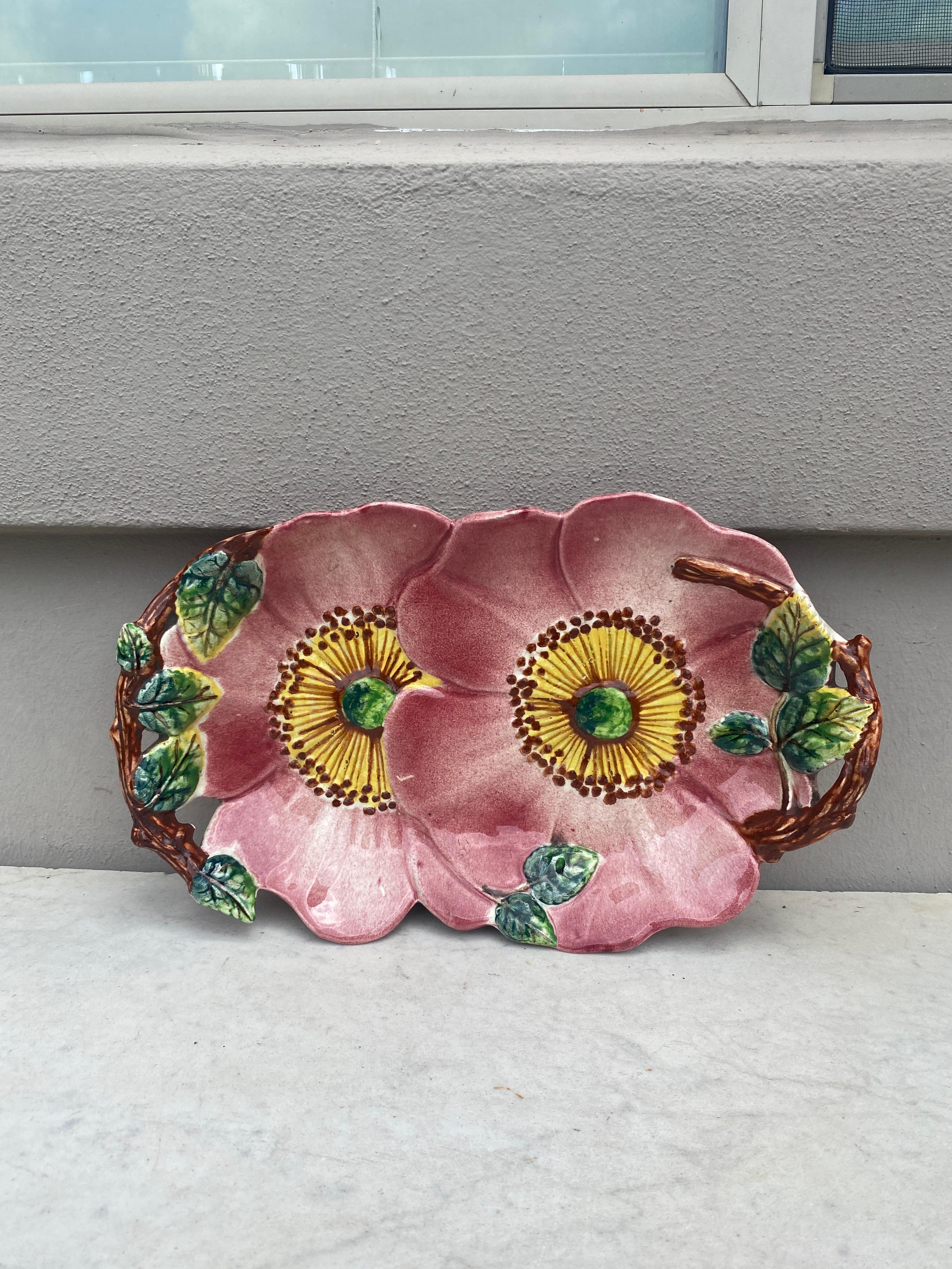 Charming Art Nouveau Majolica handled platter with two pink wild roses inspired by Delphin Massier, circa 1900.