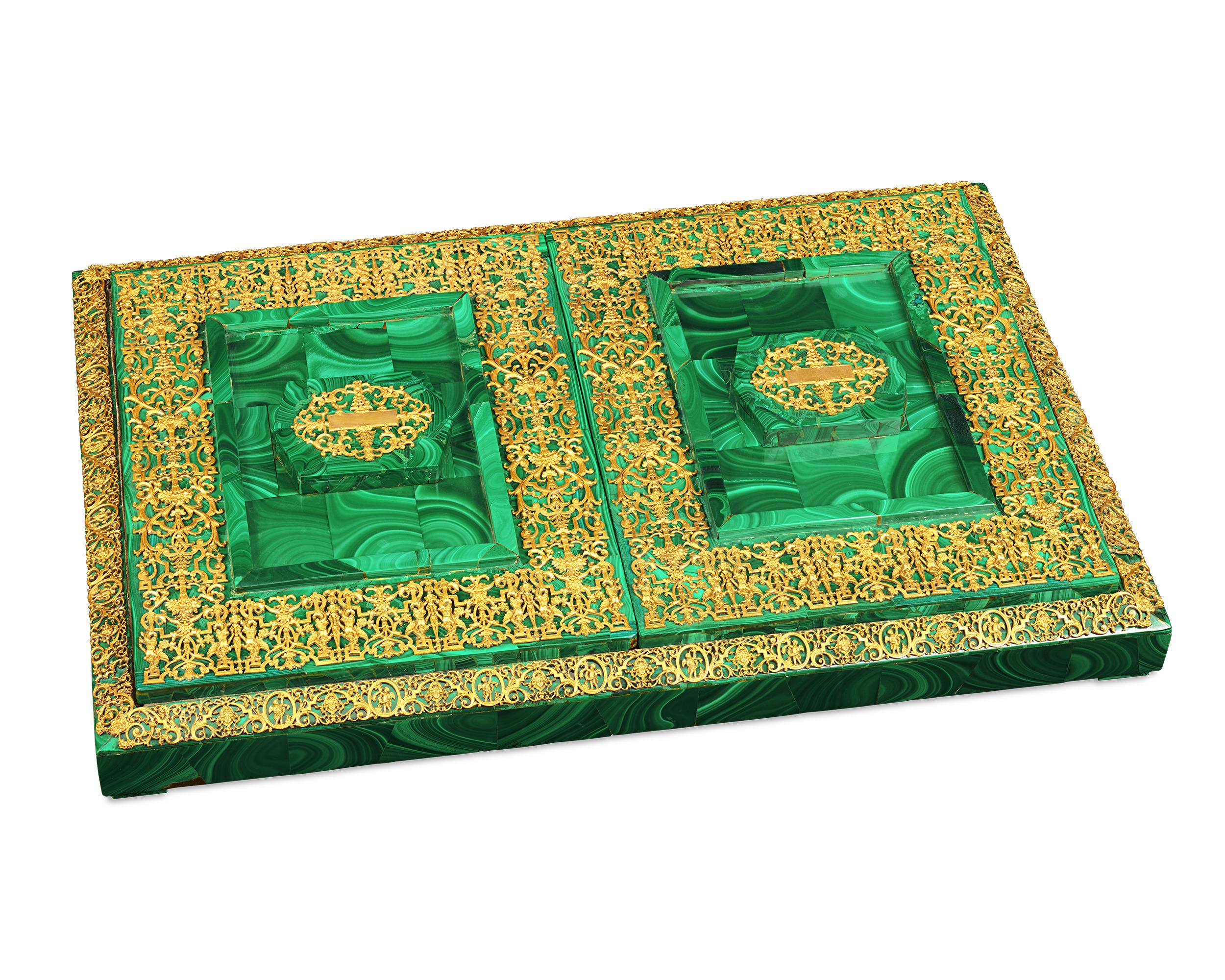 This stunning malachite backgammon set is almost certainly one-of-a-kind. Handcrafted of malachite, gilt brass and dyed leather, the favorite household game takes a luxurious form in this exquisite objet d’art. The backgammon board is cleverly