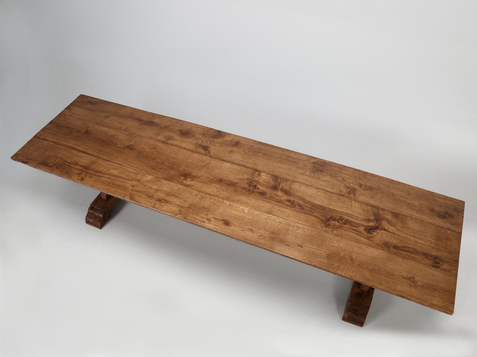 Mammoth, 12’ French trestle table, that will comfortably seat 14 people and in a pinch, will seat 16. The French trestle tabletop, is composed of only 3 very wide boards, with incredible grain and an aged deep wax finish. Although this French
