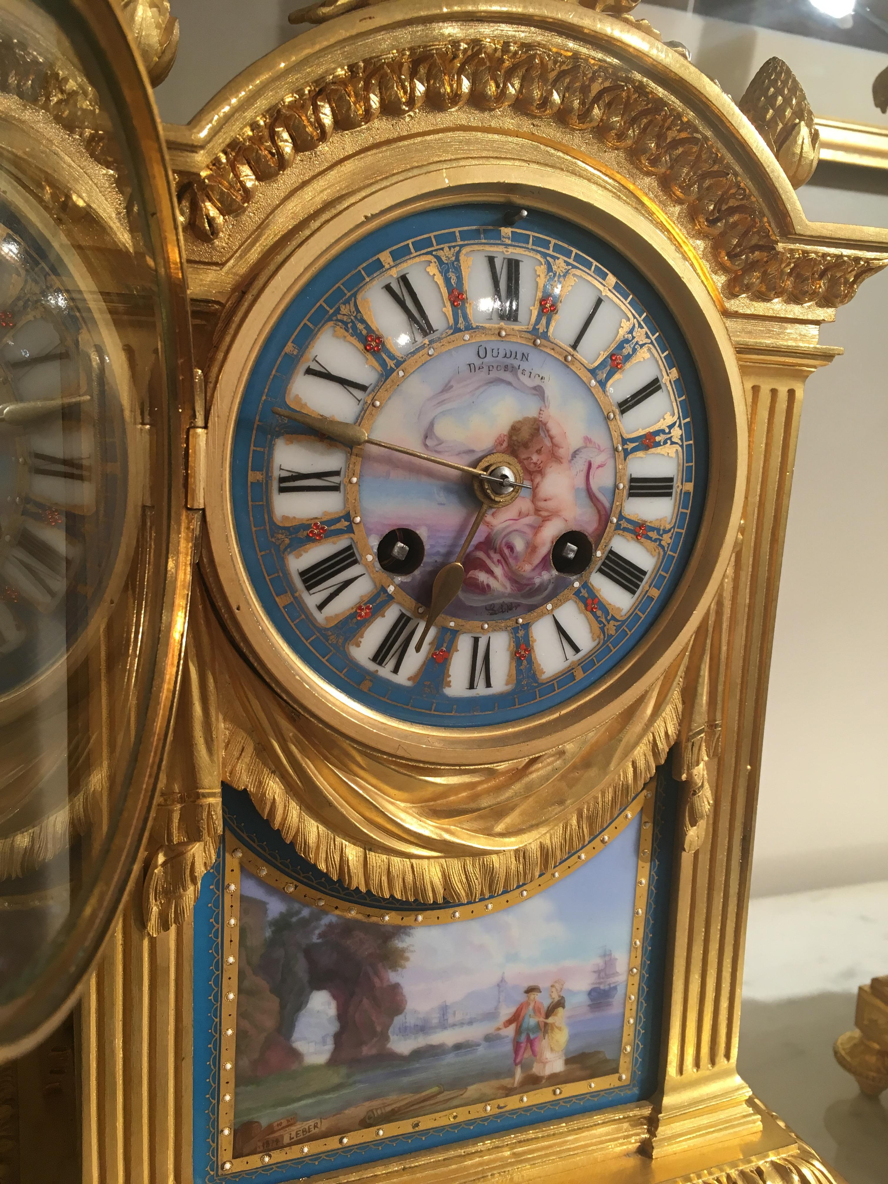 Ormolu French Mantel Clock and Candelabra of Gilt Bronze and Blue ‘Sèvres’ Porcelain For Sale