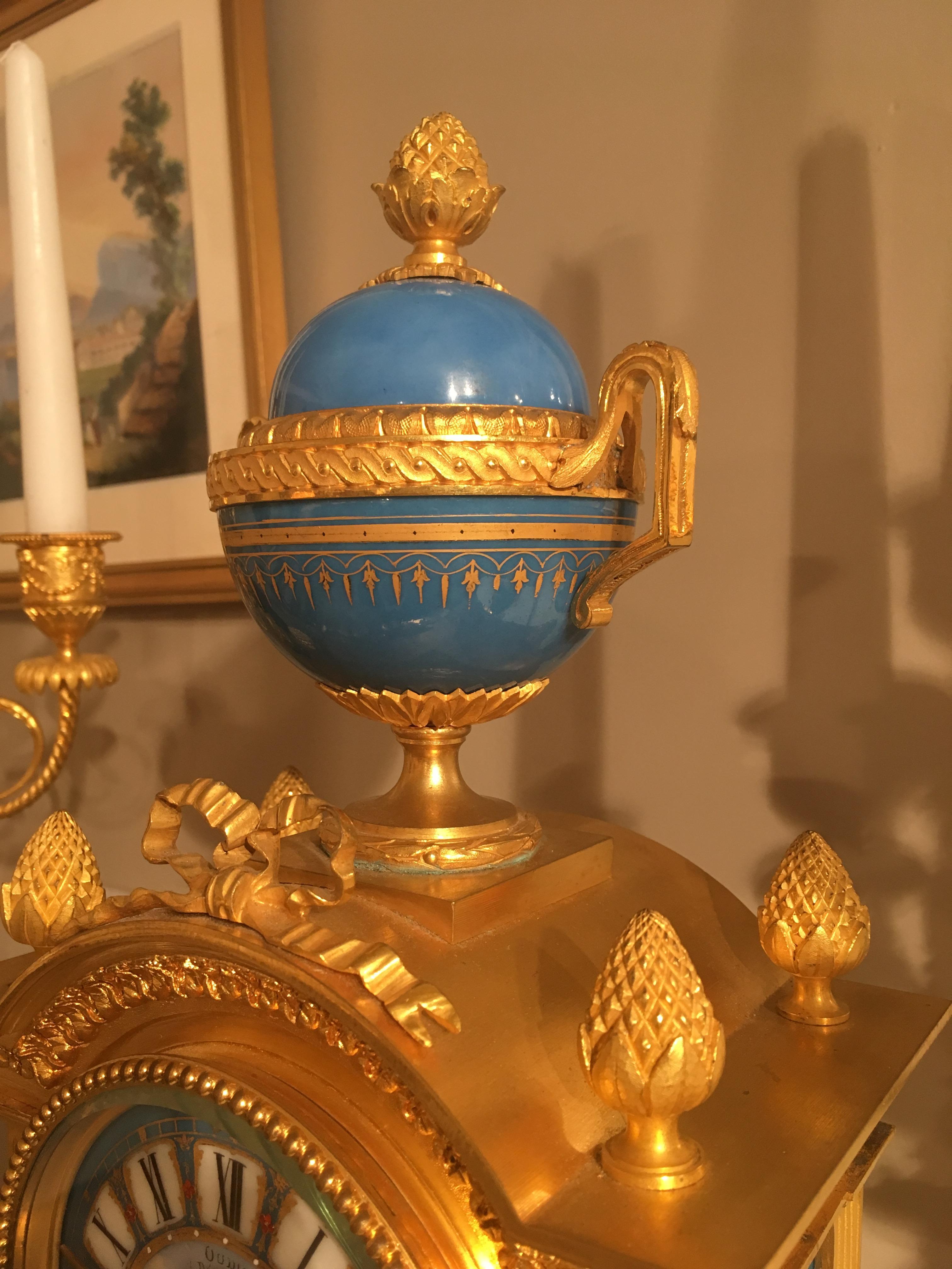 French Mantel Clock and Candelabra of Gilt Bronze and Blue ‘Sèvres’ Porcelain For Sale 1