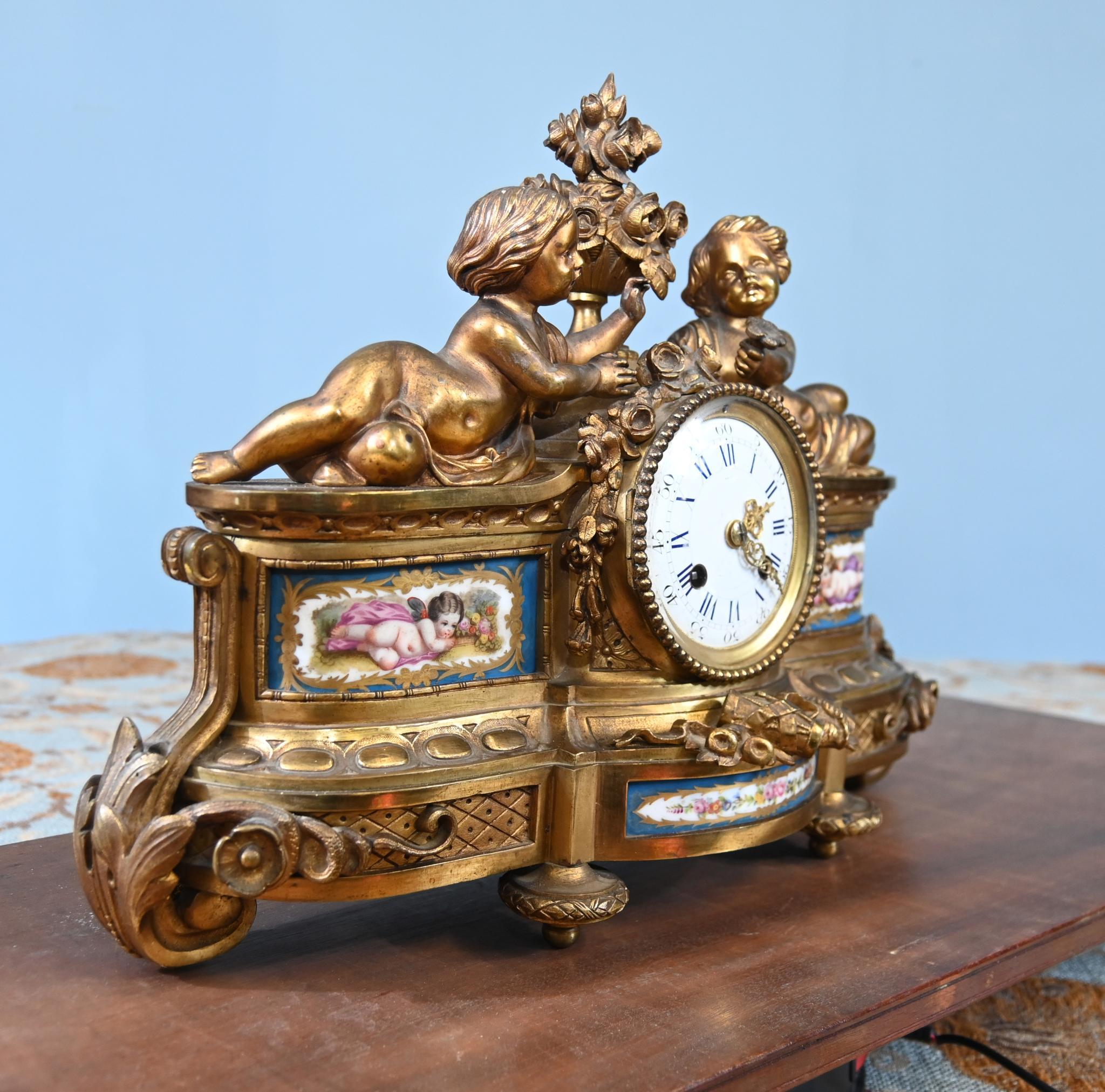 Late 19th Century French Mantel Clock Gilt Cherub Sevres Plaques 1890 For Sale