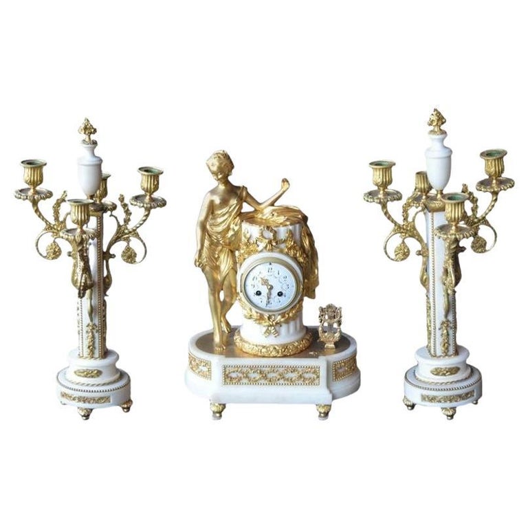 French Marble and Gilded Bronze Clock Set For Sale at 1stDibs