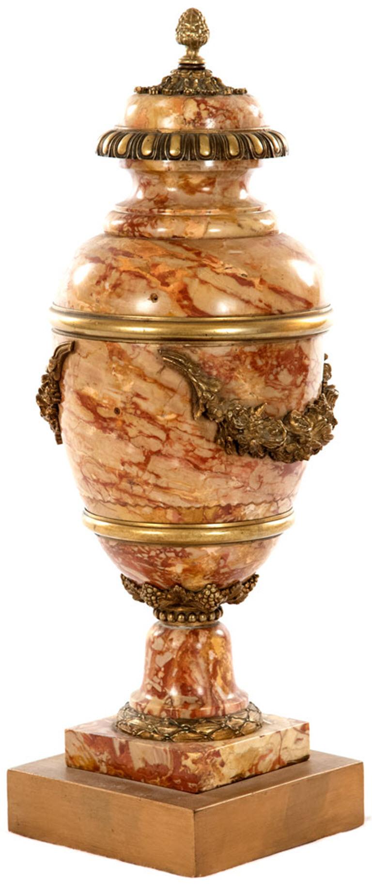 A Napoleon III Sarrancolin Ilhet marble and gilt bronze baluster vase on gilt bronze plinth.

Measures: 25.5 x 9 x 9 in.