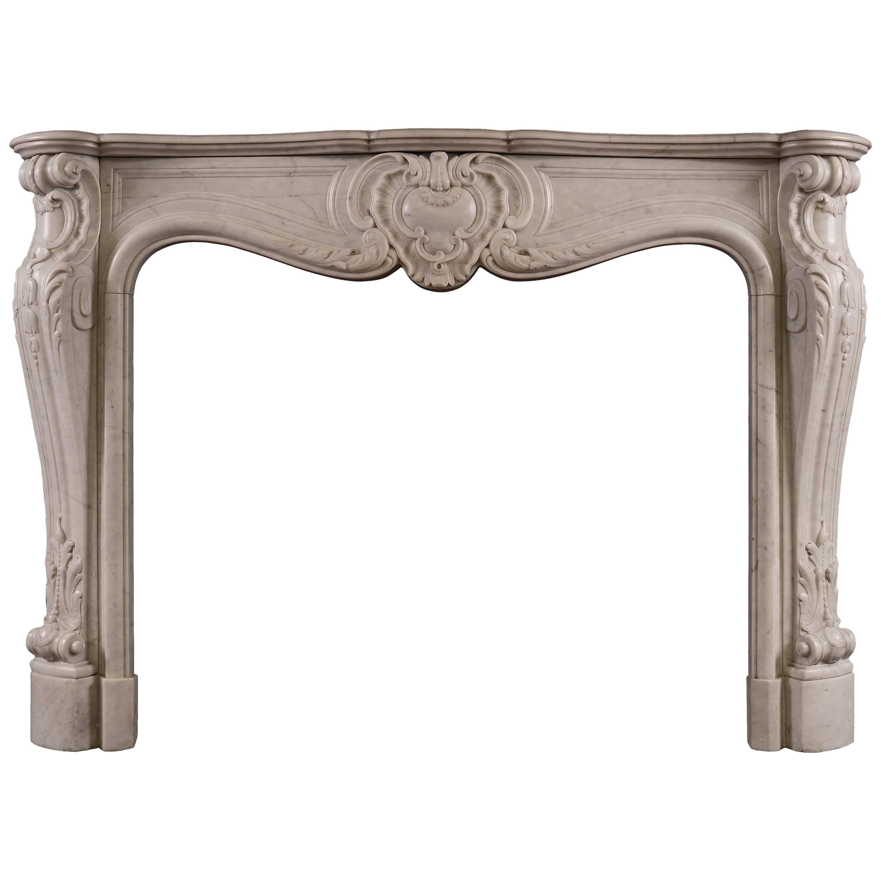French Marble Fireplace in the Louis XV Style For Sale
