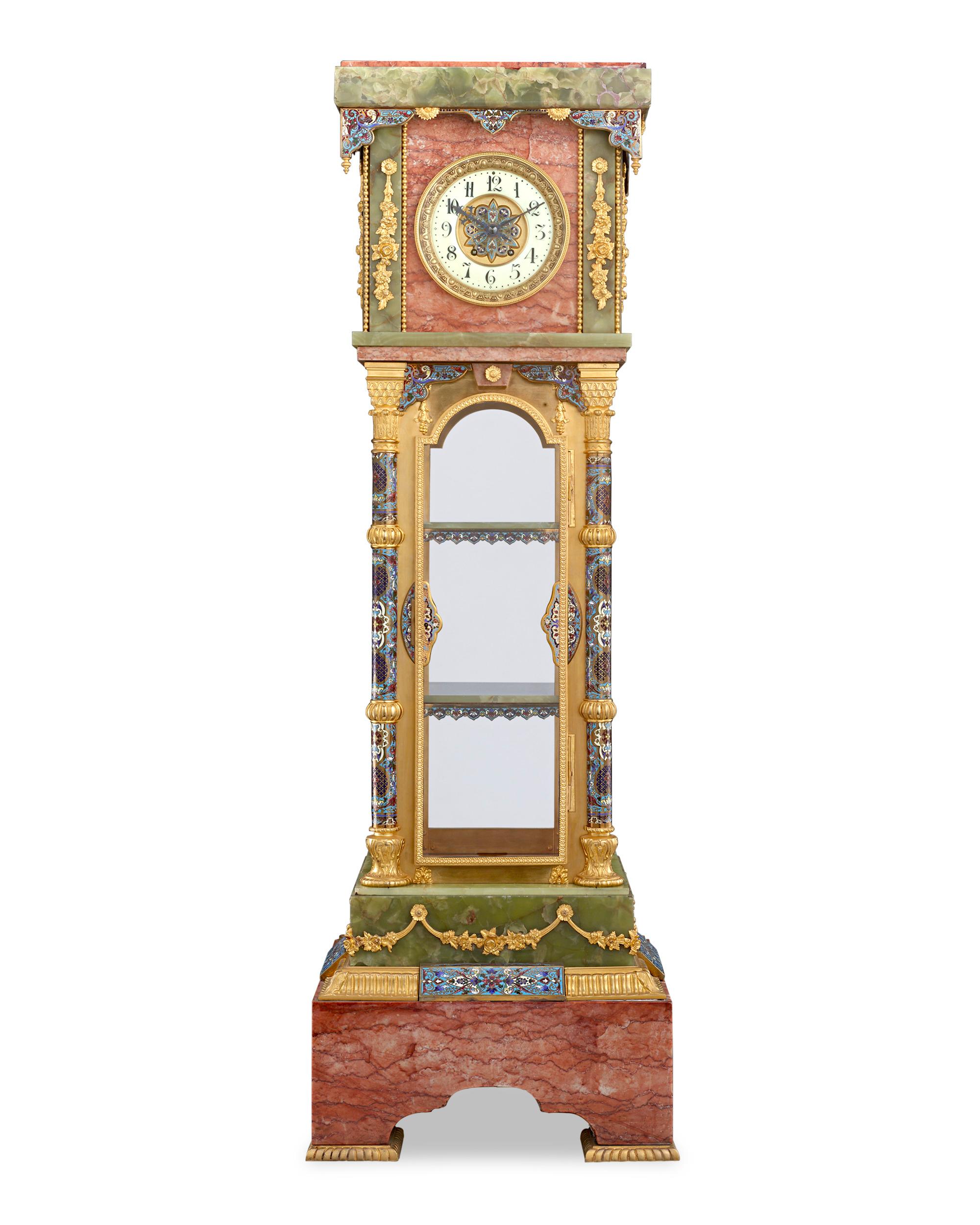 This beautiful French vitrine clock styled in the Moroccan taste is an exquisite work of artistry and craftsmanship. Featuring a clock, thermometer and barometer, no detail has been overlooked regarding its functionality, design and construction.