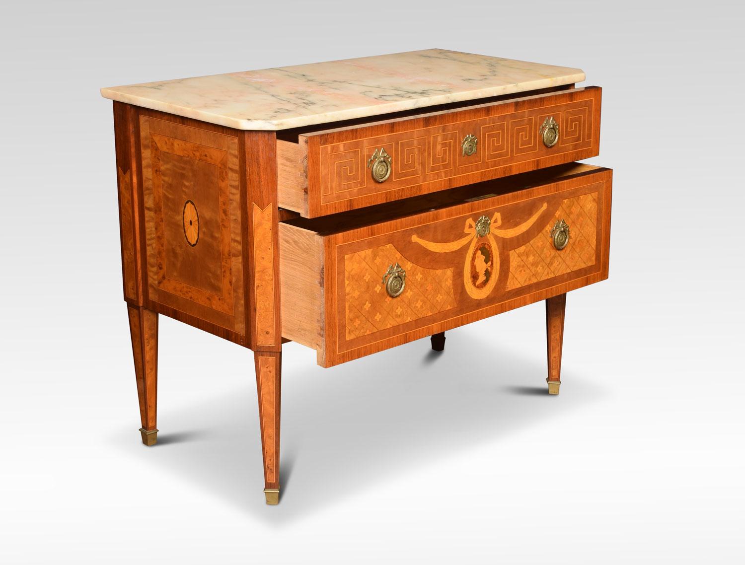 French marble top and marquetry commode, the veined marble top with canted front angles, over two graduated drawers, The top drawer with Greek key inlay, the lower drawer having a marquetry portrait medallion suspended from swags. Flanked by lattice