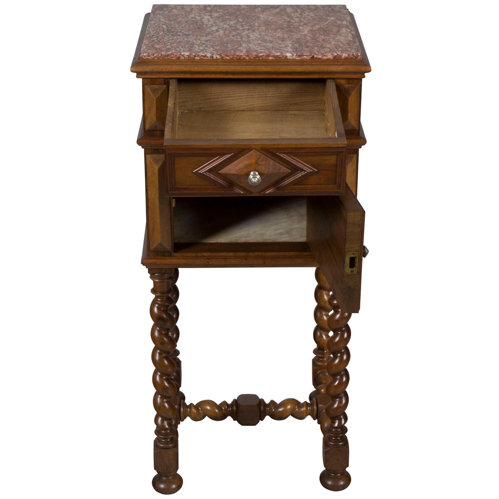 A French classic, this antique pot cupboard is made from walnut wood and probably originated around 1900. Today it is in very good condition and would function very nicely as either a lamp table, nightstand, or end table.

Antique pot cupboards