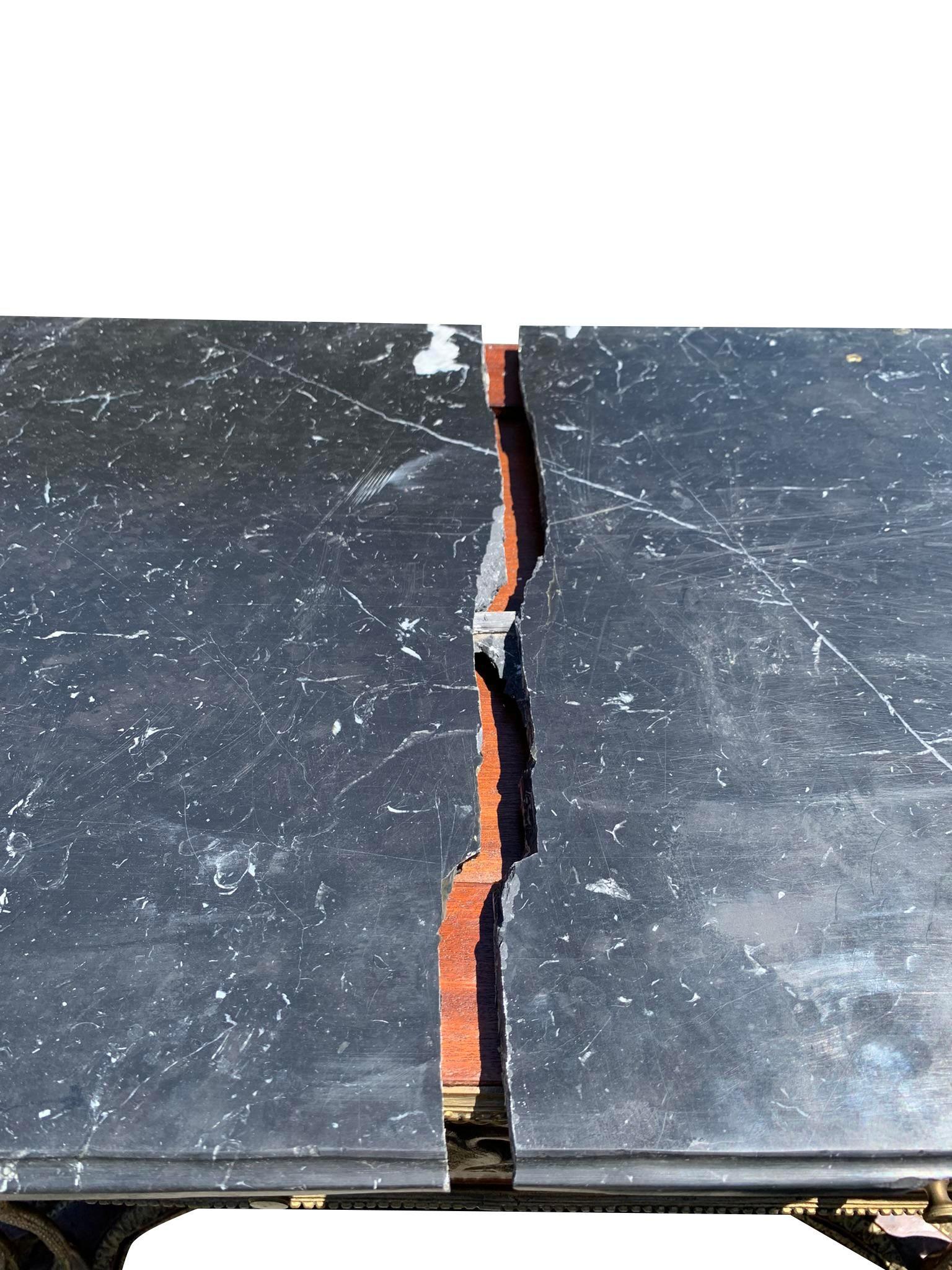 Vintage French Marble Top Brass Console Table with Mirror Front with Birds

This vintage console table is a stunning piece with a beautiful design and high-quality materials.
The brass accents and marble top create a luxurious and sophisticated