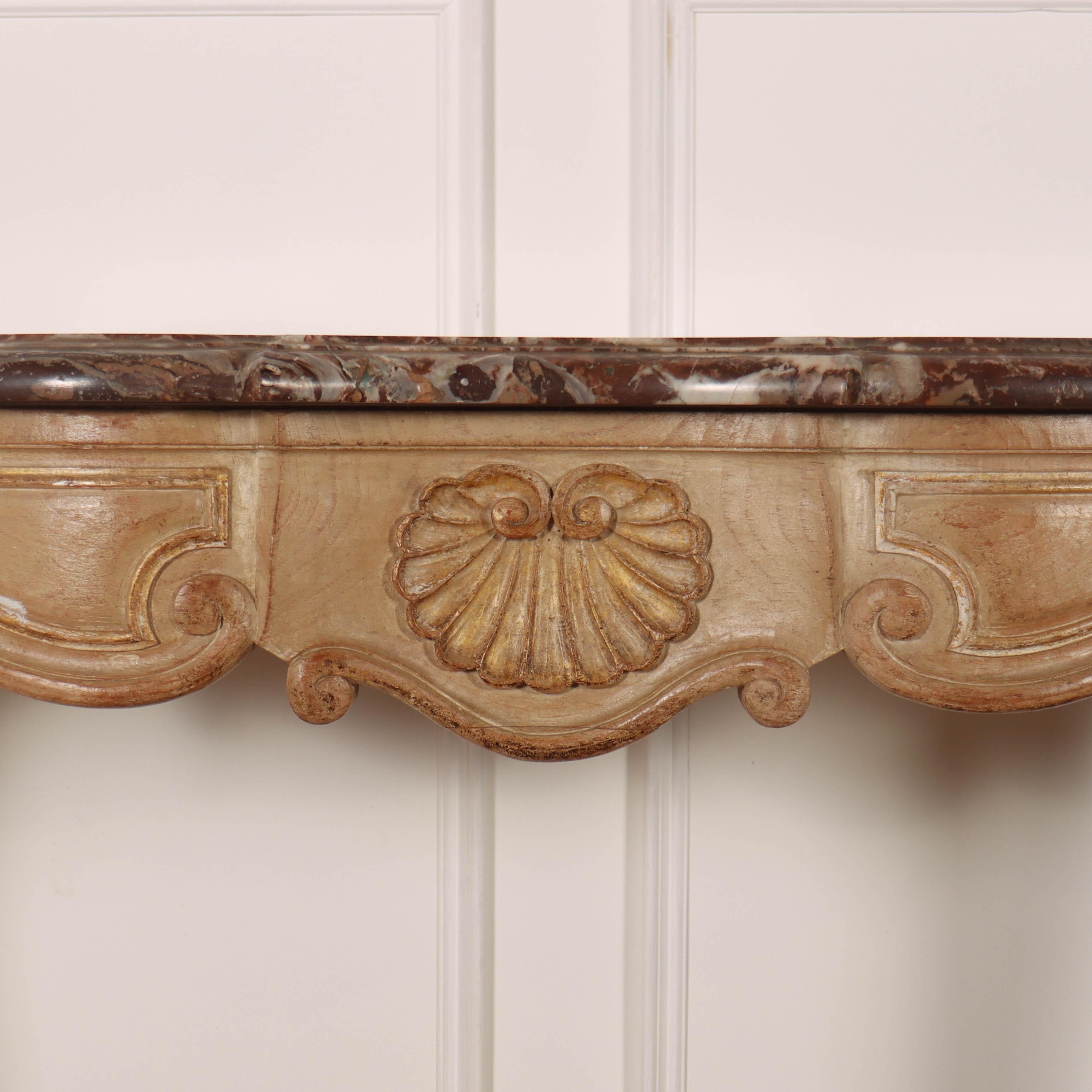 Early 19th C French bleached oak serpentine front console table with a marble top. 1830.

Dimensions
59.5 inches (151 cms) Wide
17.5 inches (44 cms) Deep
32 inches (81 cms) High.