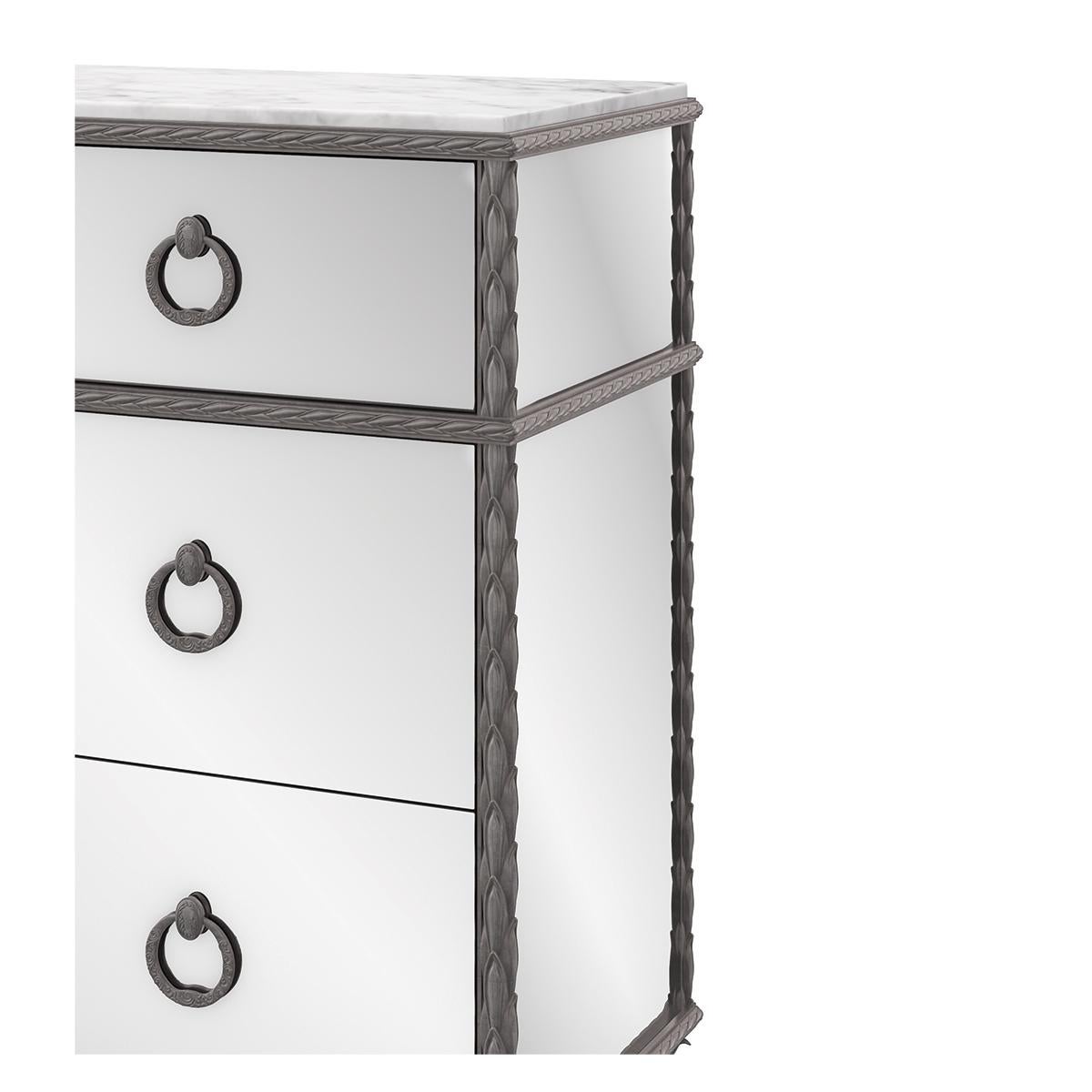 This dresser offers a stunning fusion of form and function, measuring generously to accommodate a wide array of wardrobe essentials.

The dresser features mirrored front and end panels, creating a dazzling reflective surface that enhances the light