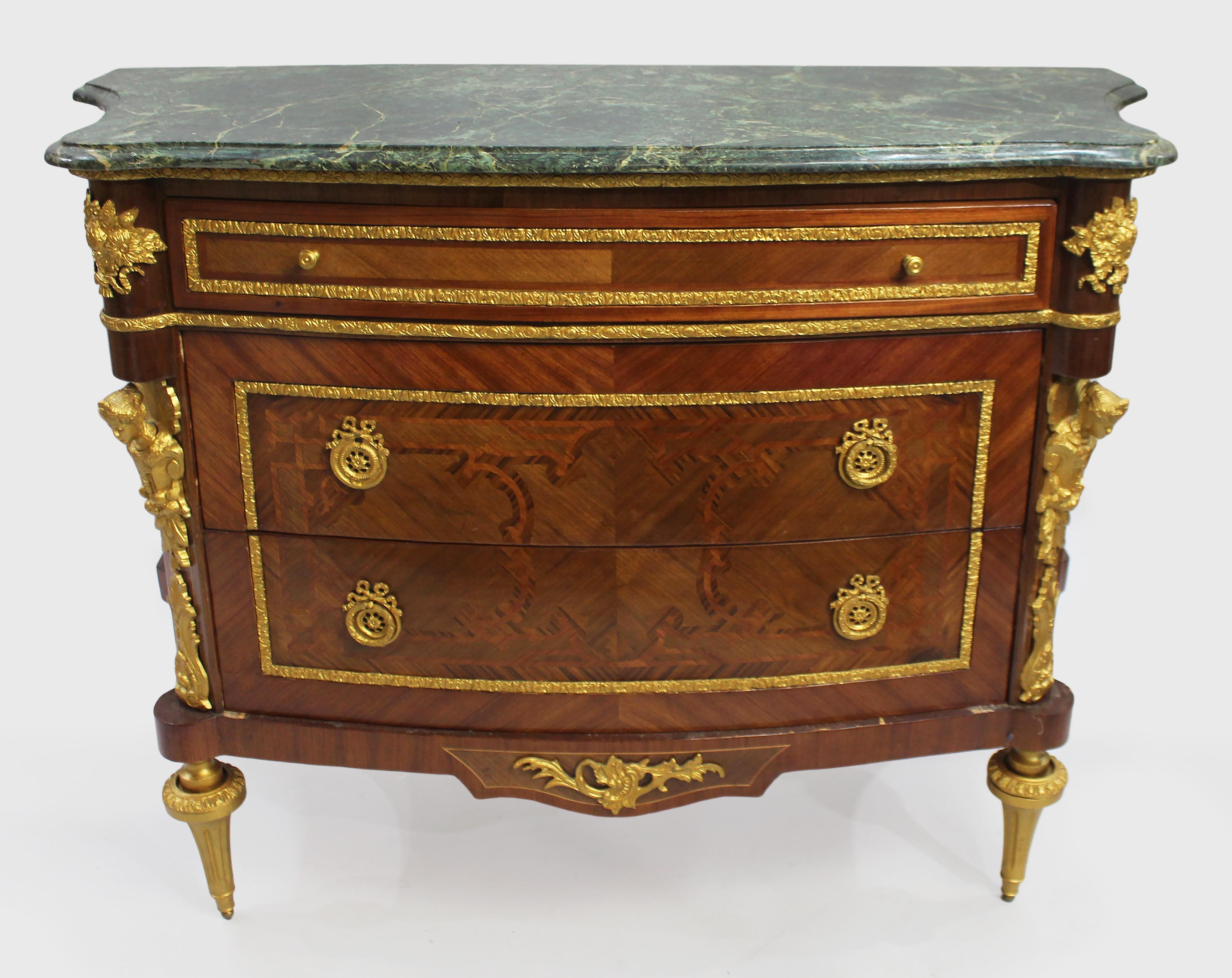 French marble topped bow fronted commode with gilt metal mounts


Late twentieth century in an eighteenth century French manner

Heavy green veined shaped marble top.

Bow fronted from with three drawers to the body. Inlaid to the whole.