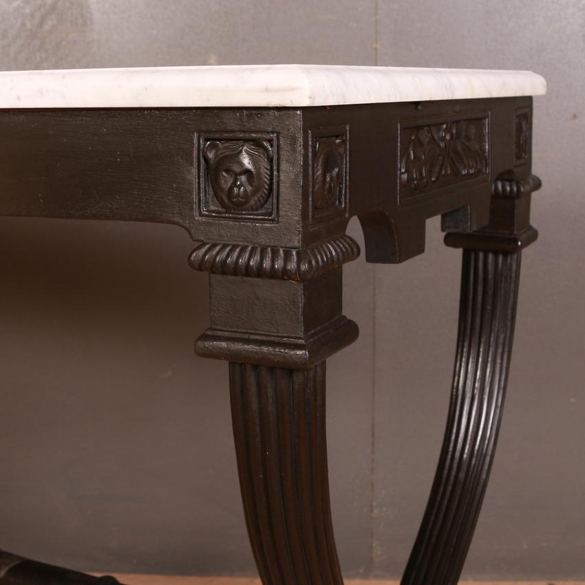 Late 19th century French ebonized marble topped side table, 1890

Dimensions:
40 inches (102 cms) wide
20 inches (51 cms) deep
30.5 inches (77 cms) high.

 