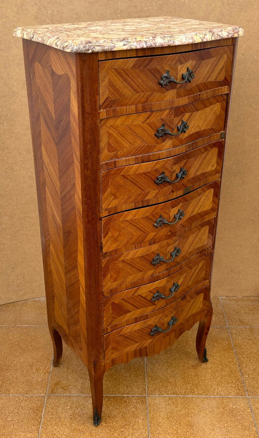 Bronzato French Marquetry And Marble Top Tall Chest Of Seven Drawers in vendita