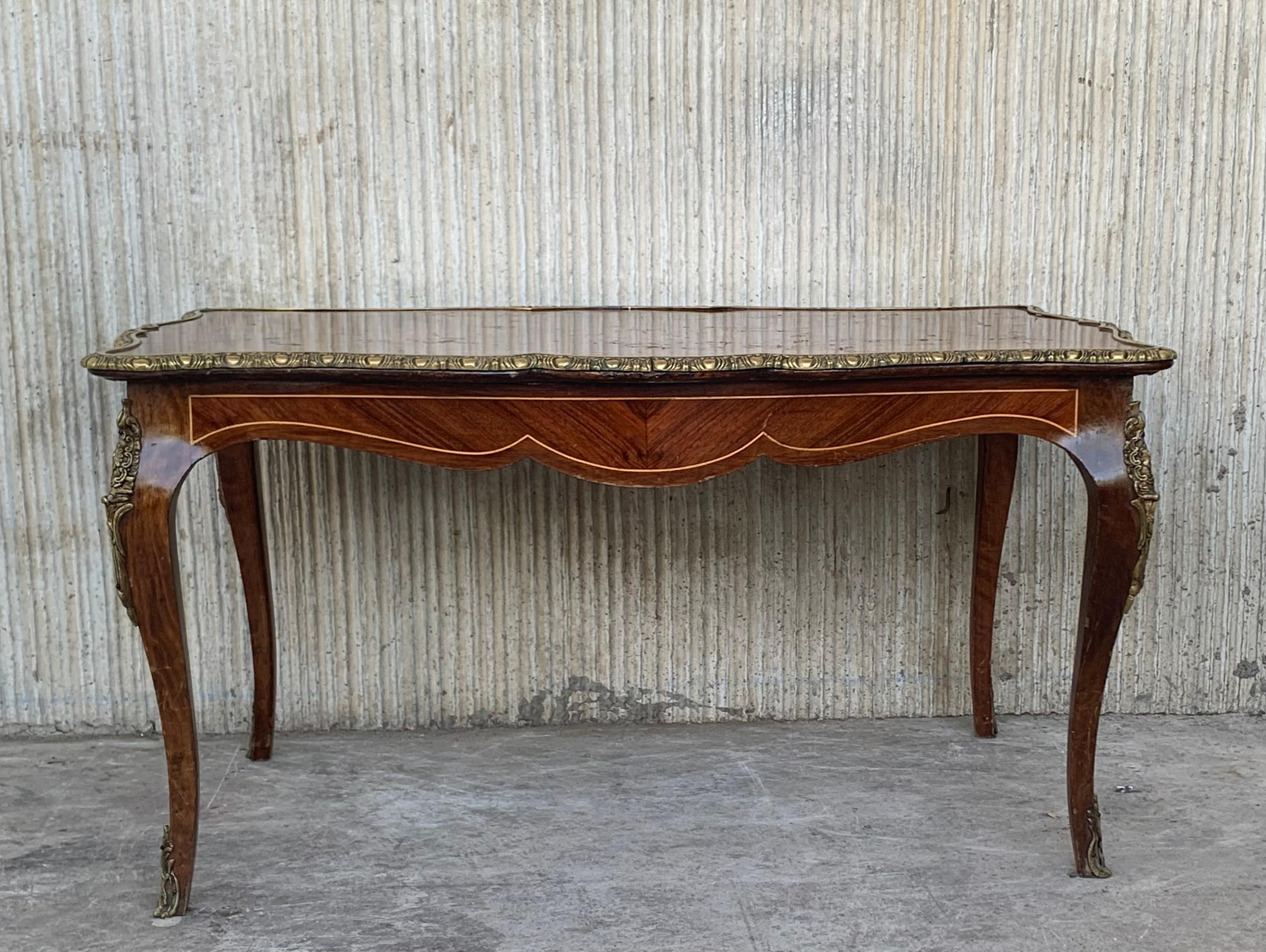 Wonderful French marquetry and bronze ormolu-mounted cocktail or coffee table.
