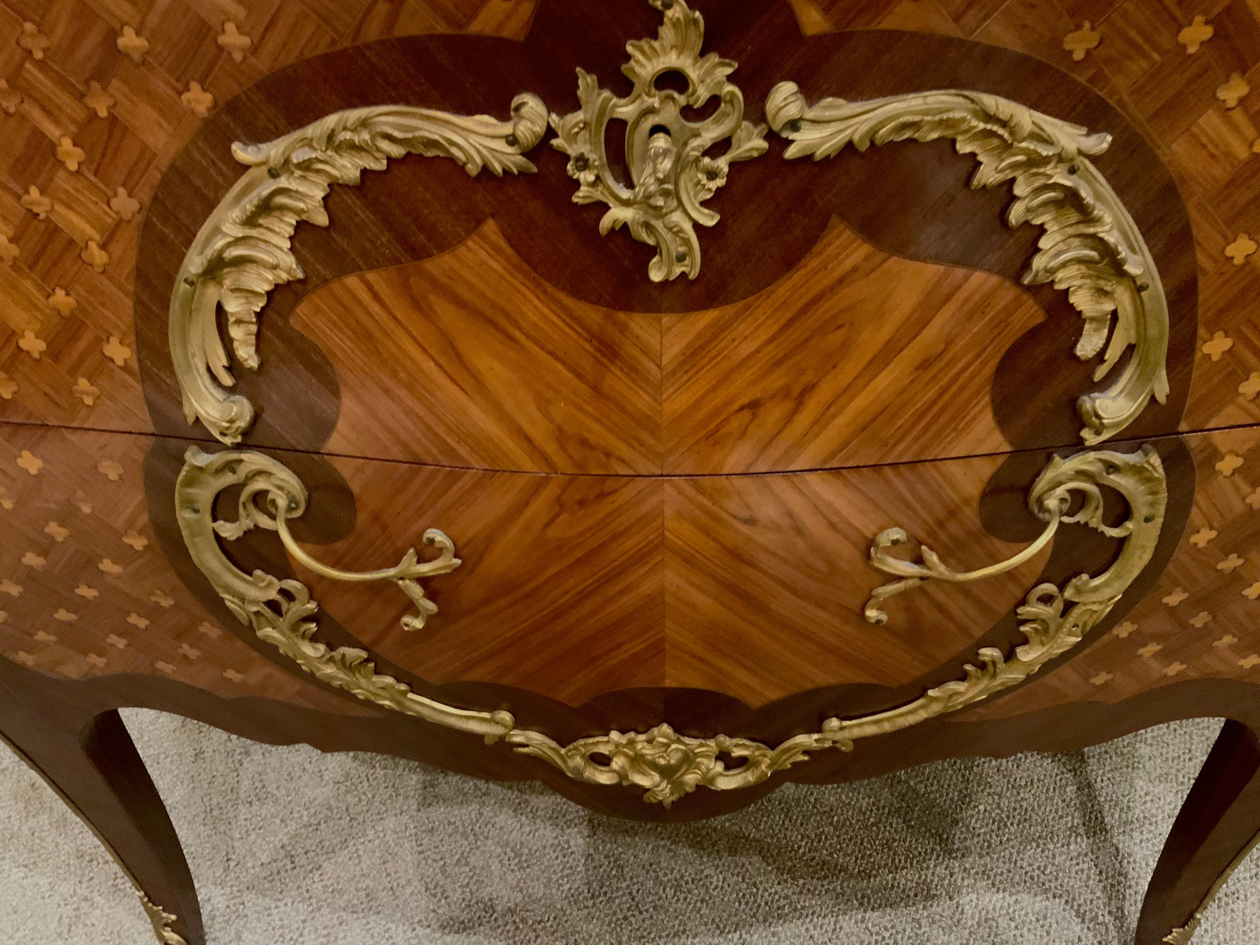 Louis XV French marquetry commode with marble top and bronze mounts For Sale