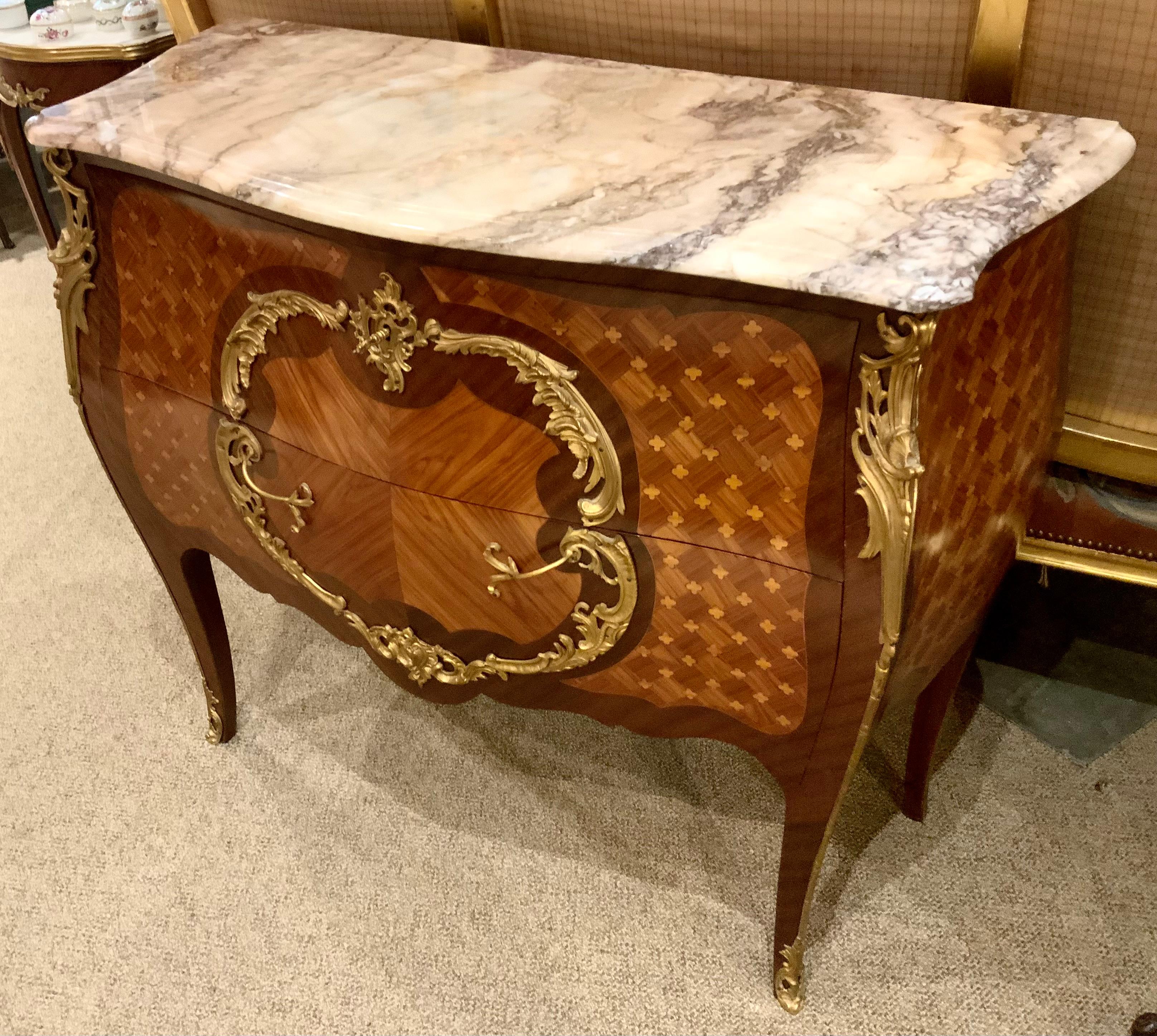 Marquetry French marquetry commode with marble top and bronze mounts For Sale