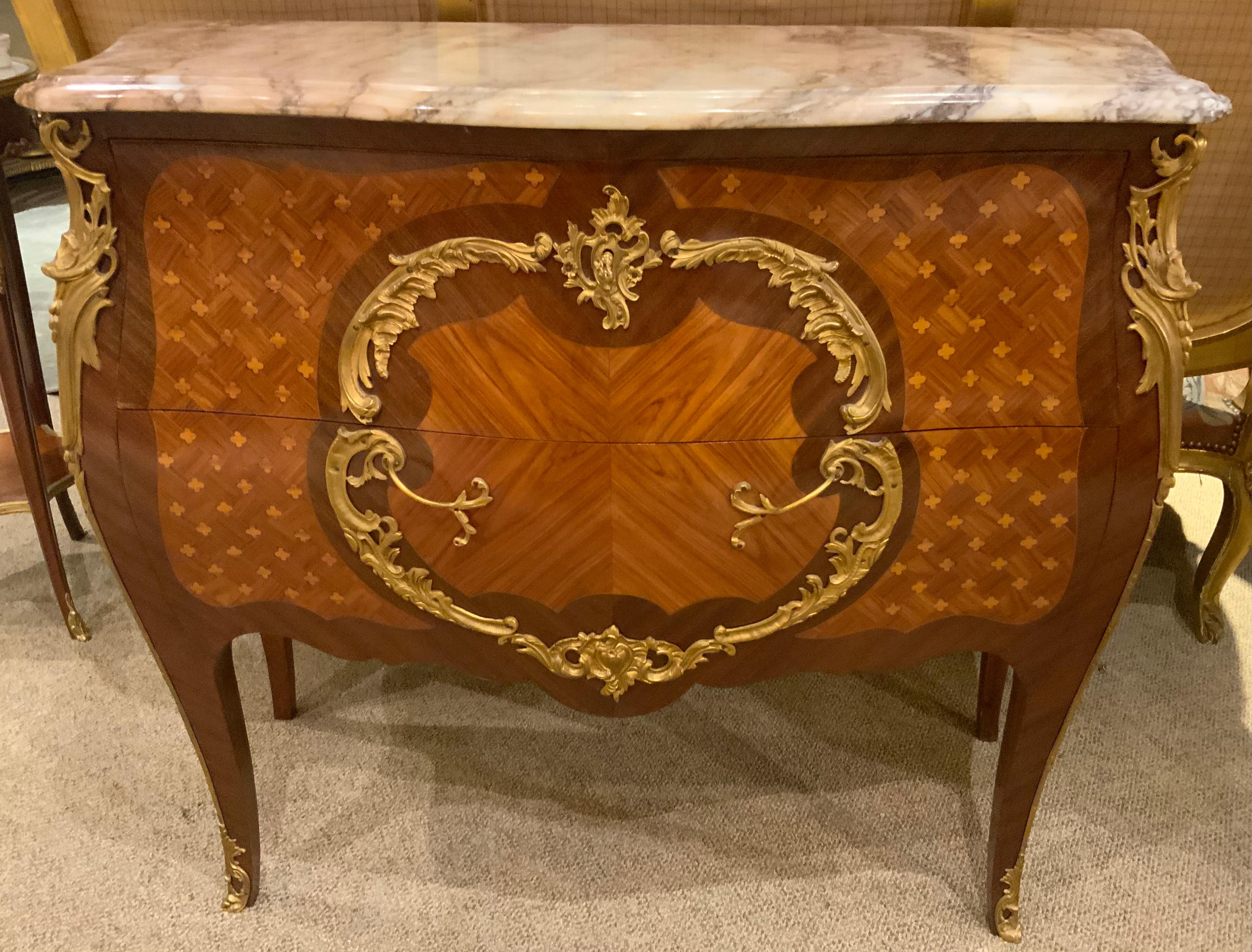 Rosewood French marquetry commode with marble top and bronze mounts For Sale