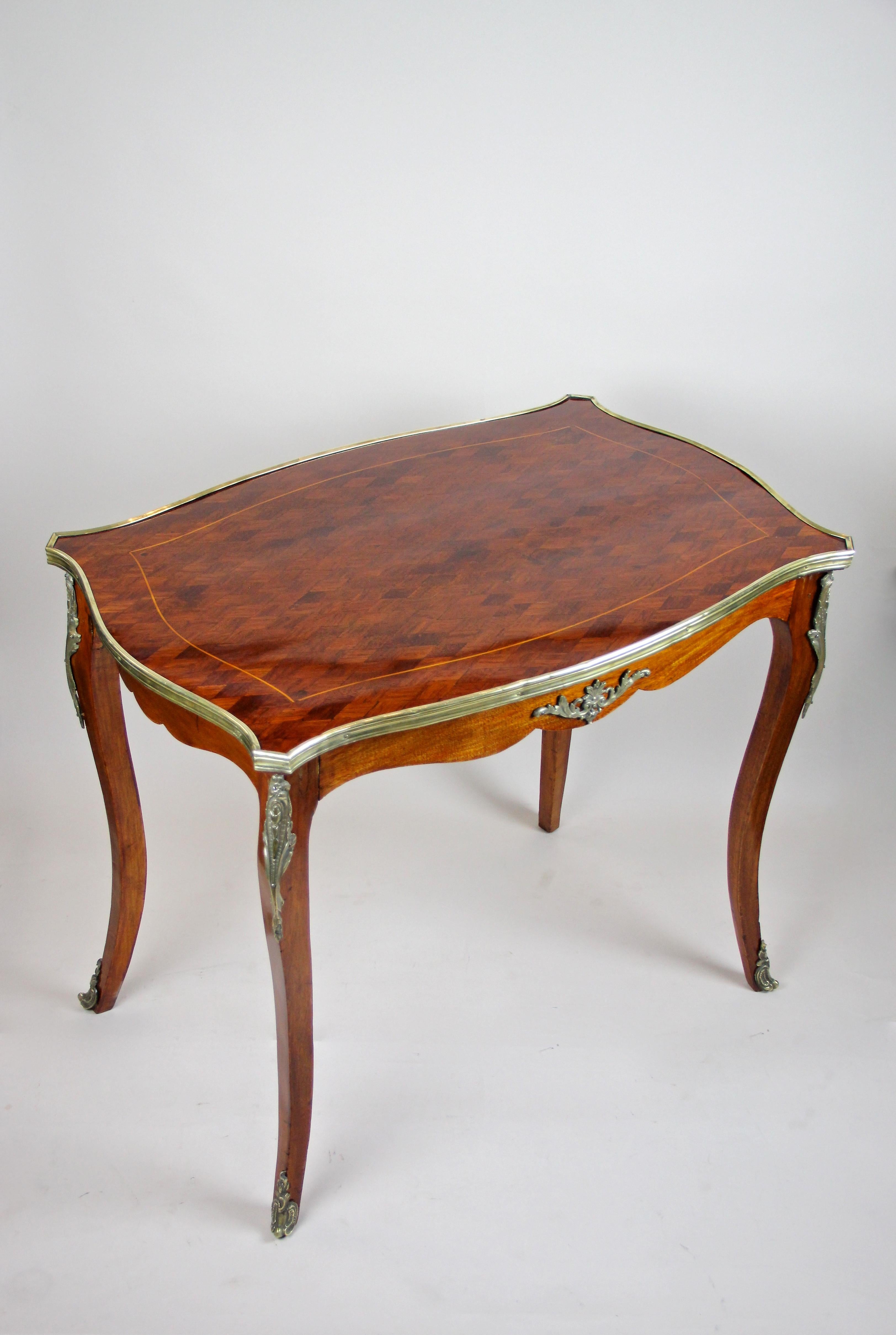 Fresh out of our restoration workshop comes this fantastic French marquetry side table from the period Napoleon III, circa 1870. Well known for their unique style the French carpenters were true masters when it comes to elaborate furniture. An