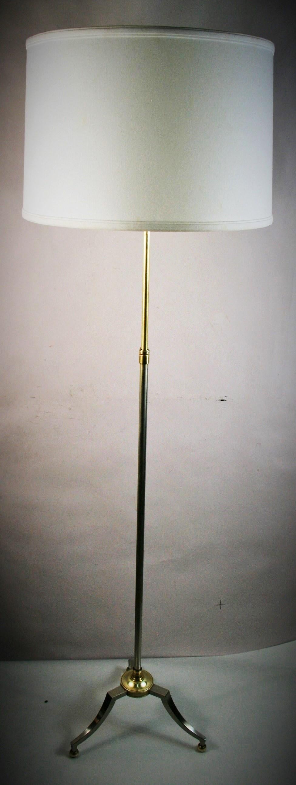 8-149a French nickel and brass adjustable tripod base floor lamp
Needs Rewiring
Take 2 60 watt bulbs
Shade not included.