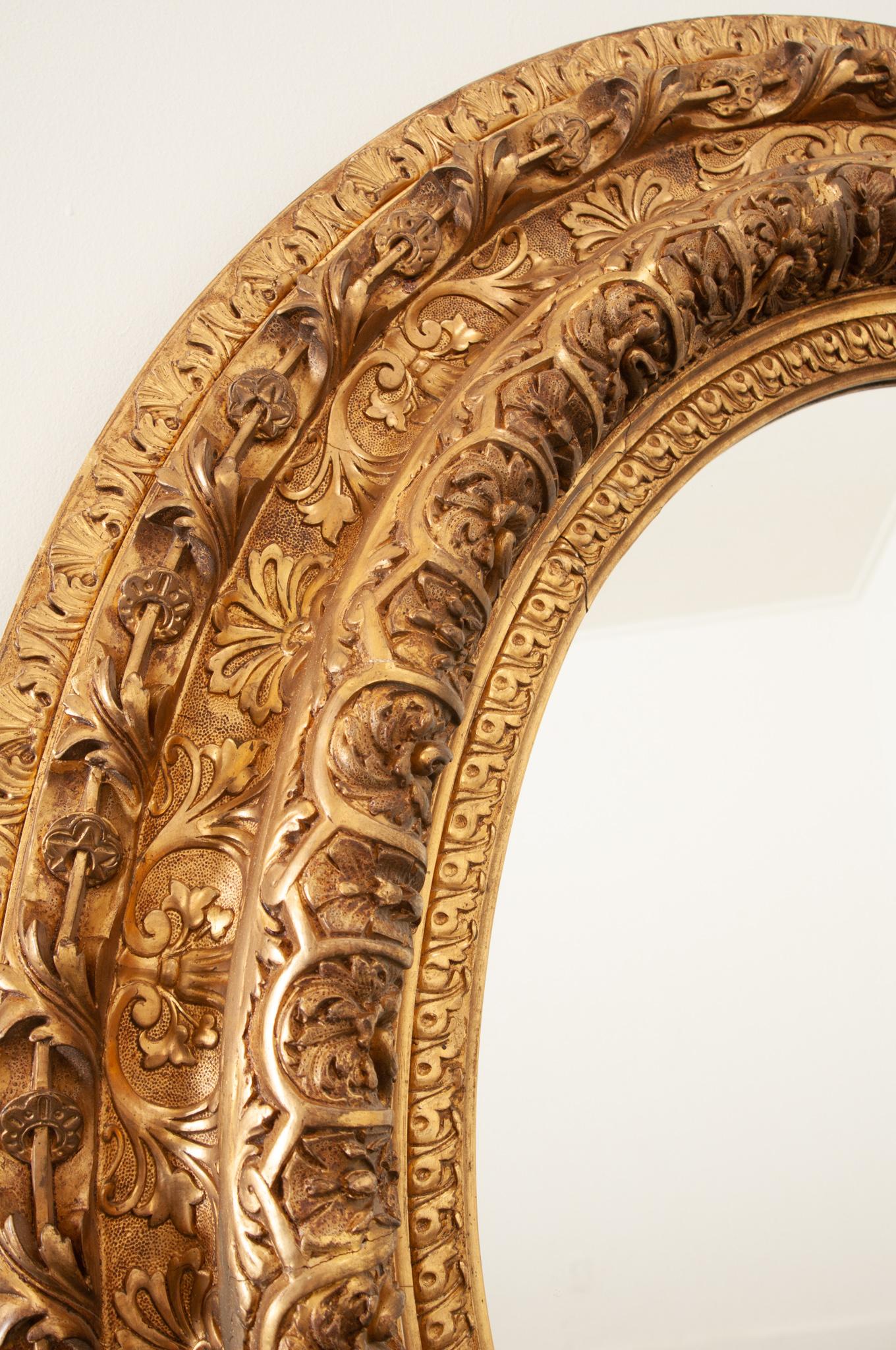 French Massive Napoleon III Giltwood Oval Mirror For Sale 4