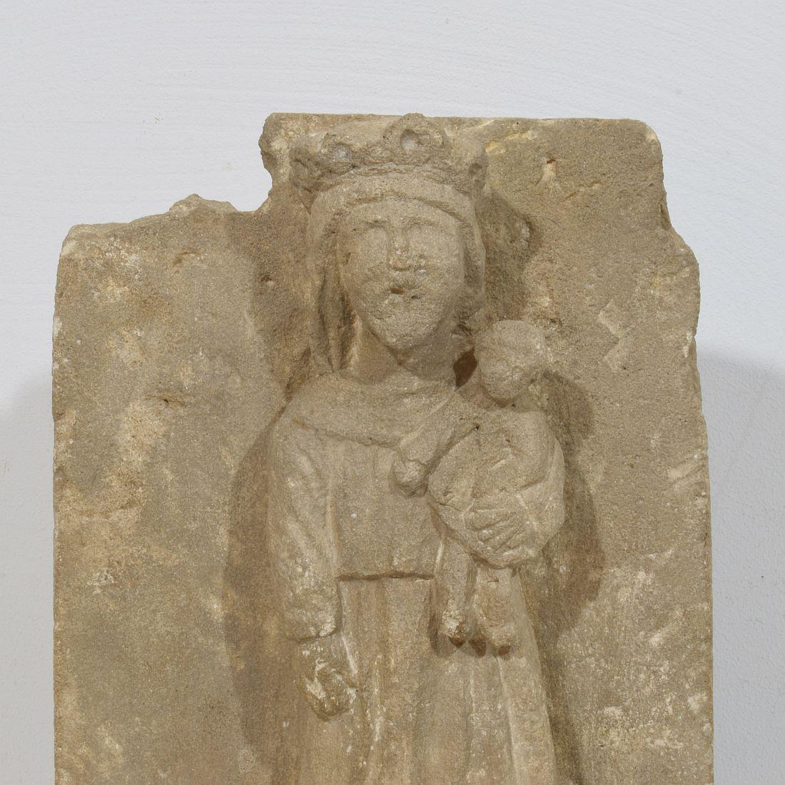 French Medieval Carved Stone Panel Depicting A Madonna With Child For Sale 2